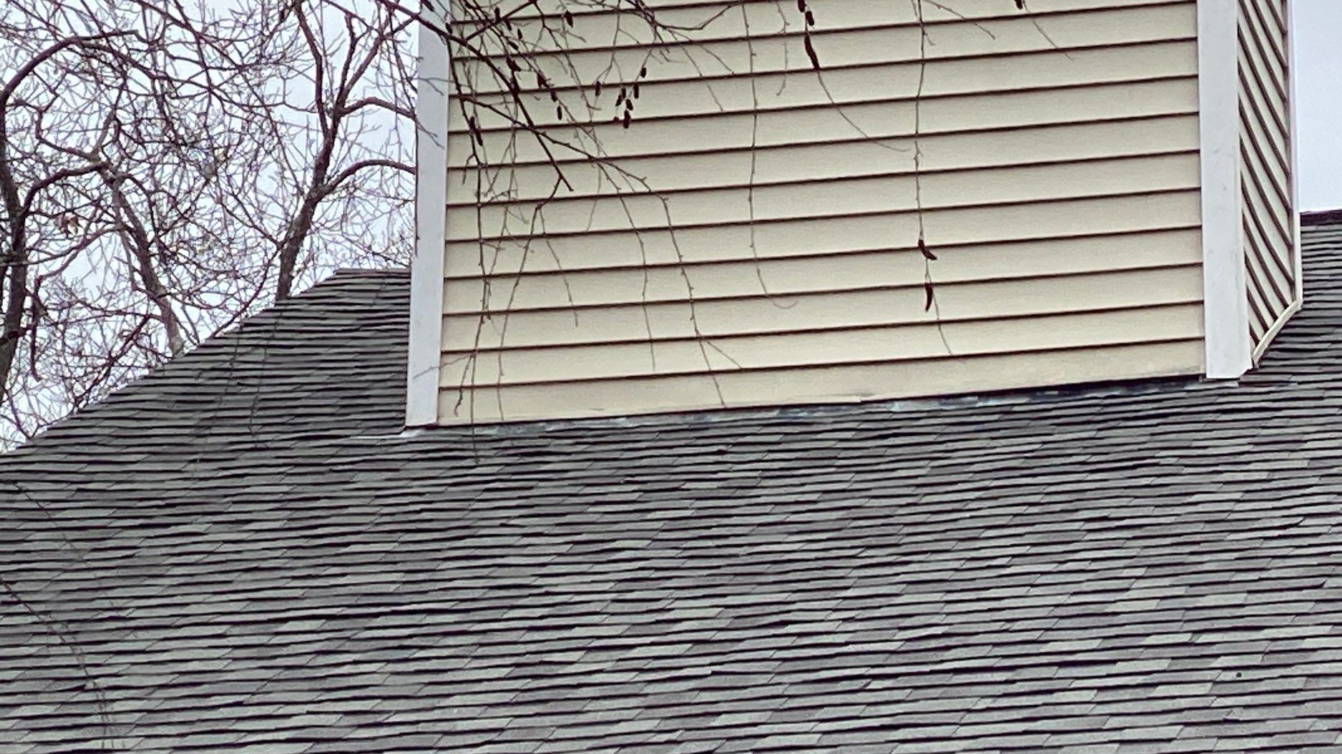 Close-up detail of new gray architectural shingles, Cumberland residential roofing