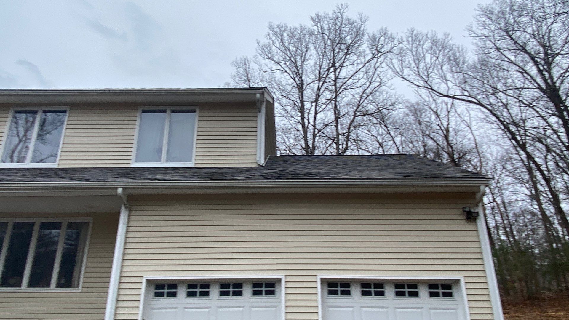 Garage wing with new roof and gutters, Cumberland residential roofing