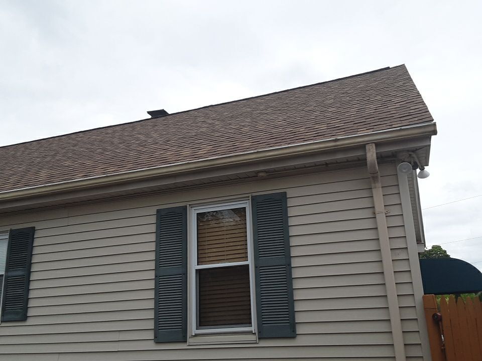 New architectural shingles and eave, Johnston roof repair