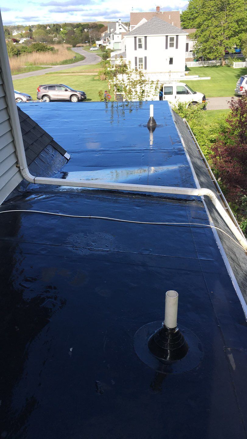 After — Portsmouth RI Commercial Roofing — Silicone Restoration Coating Over Membrane