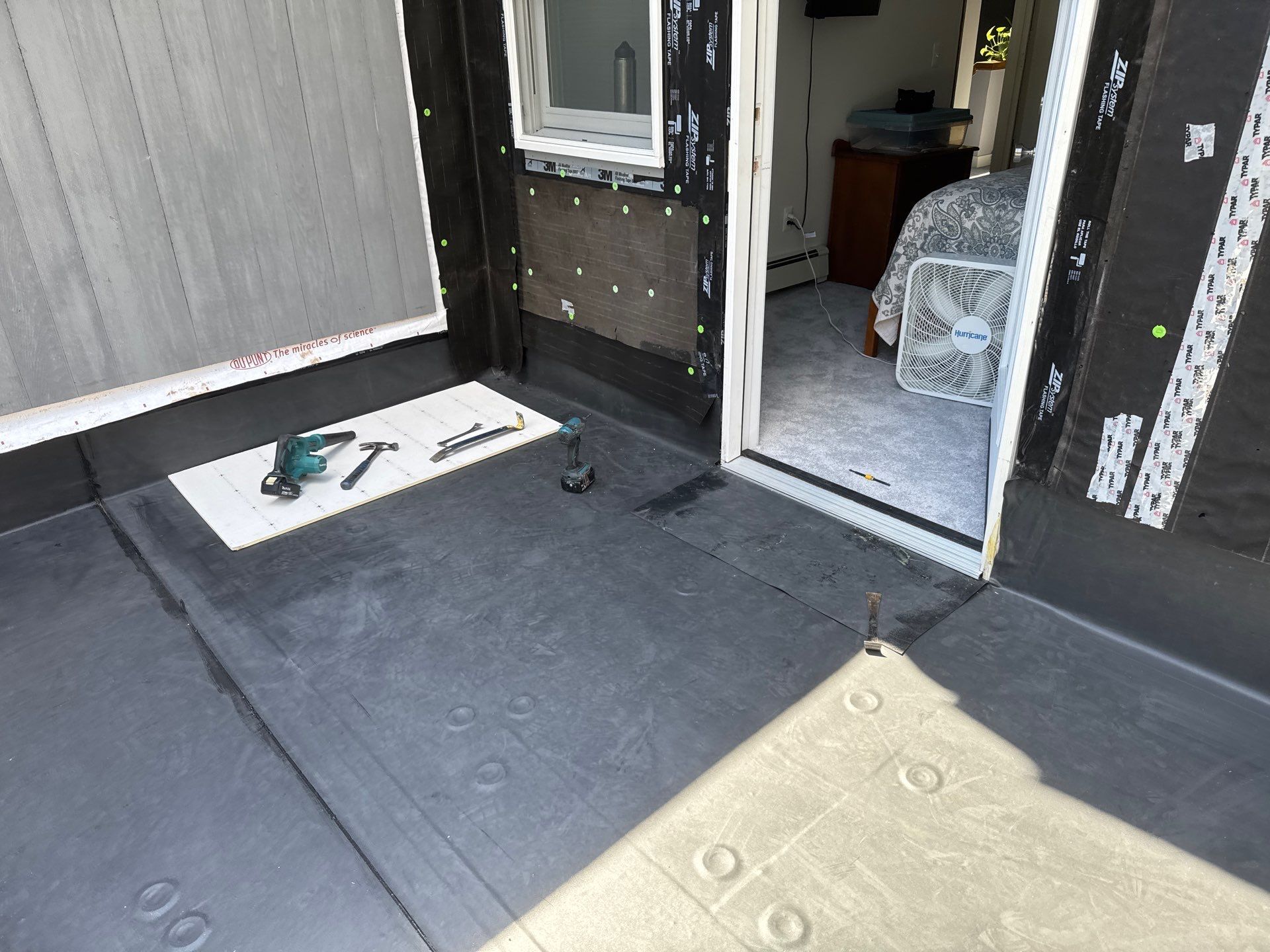 Burrillville Commercial Roofing — Fully-Adhered EPDM Membrane Over a Low-Slope Rear Deck