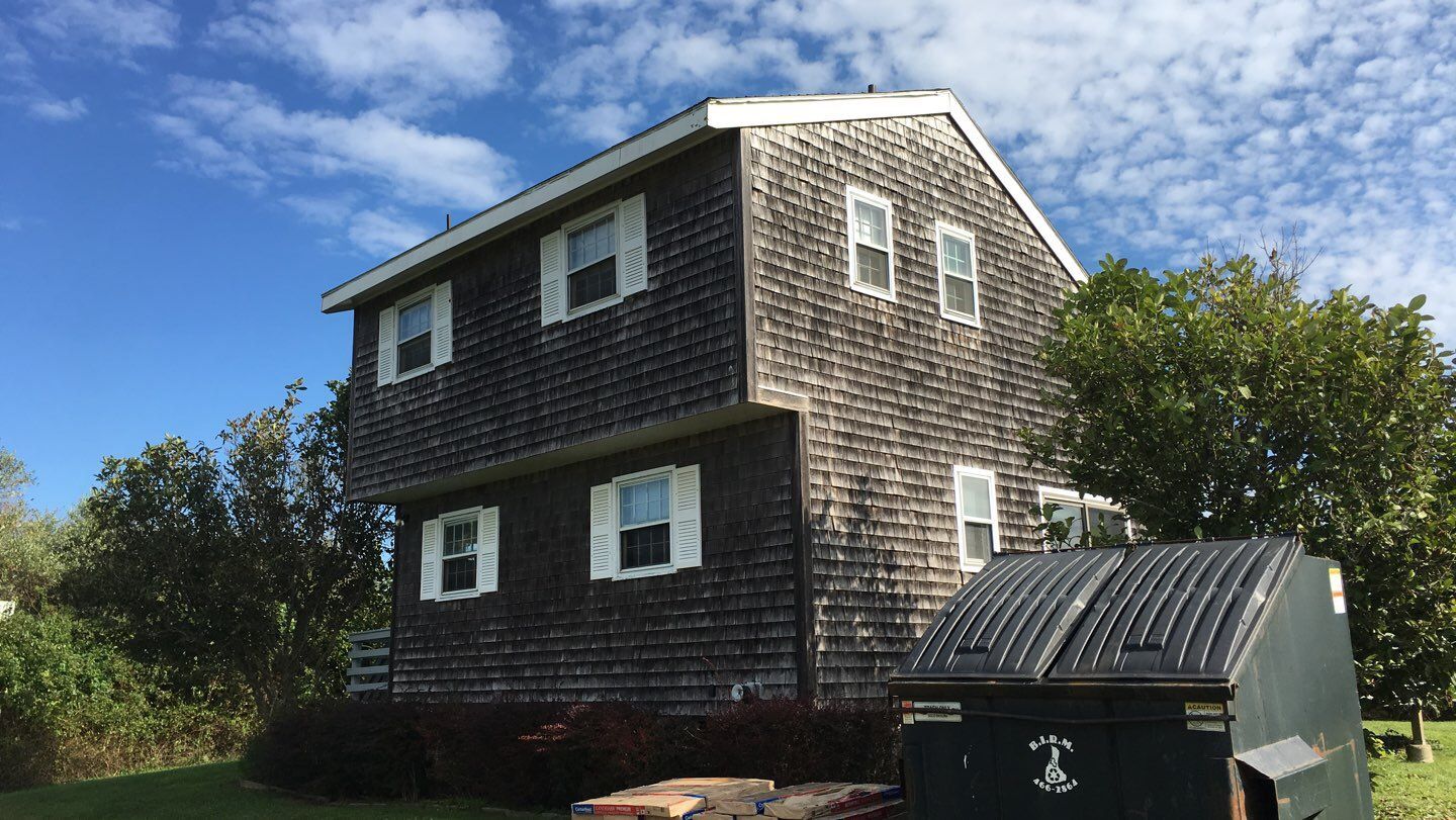 Cedar-shingle home with new roof, New Shoreham residential roofing