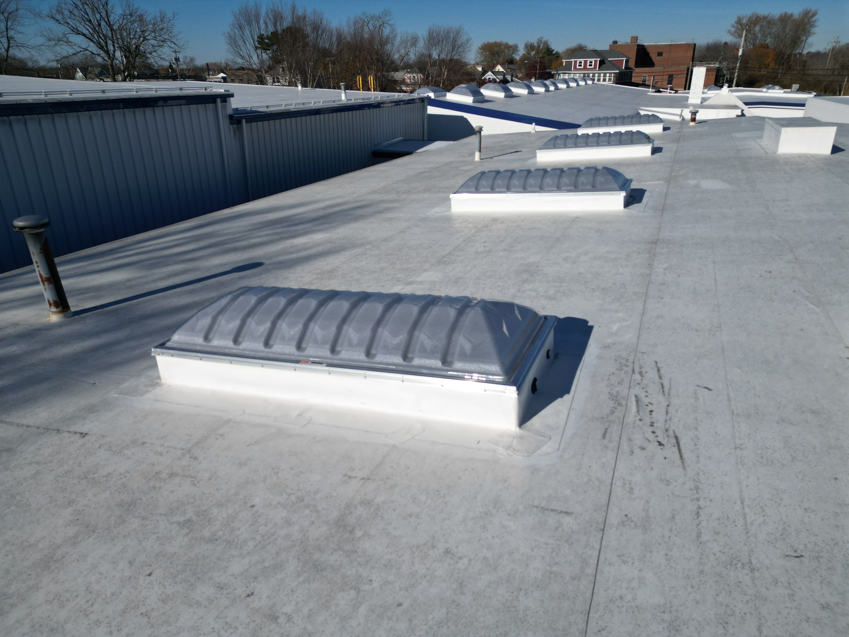 Installed dome skylights, roof-level view, Warren skylight installation