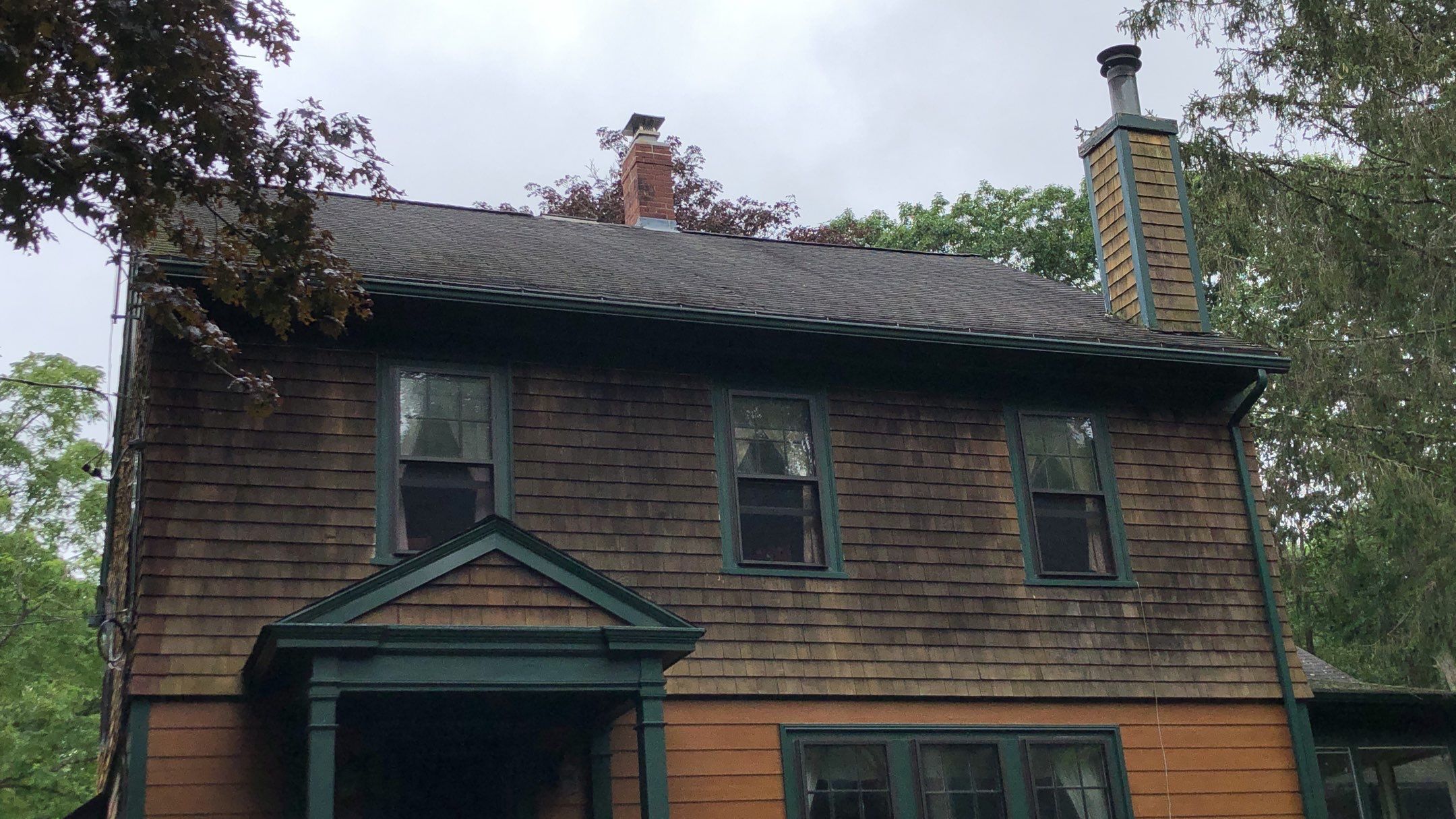 After — Foster, RI Cedar Shake Siding Replacement — Natural Wood Exterior Refresh