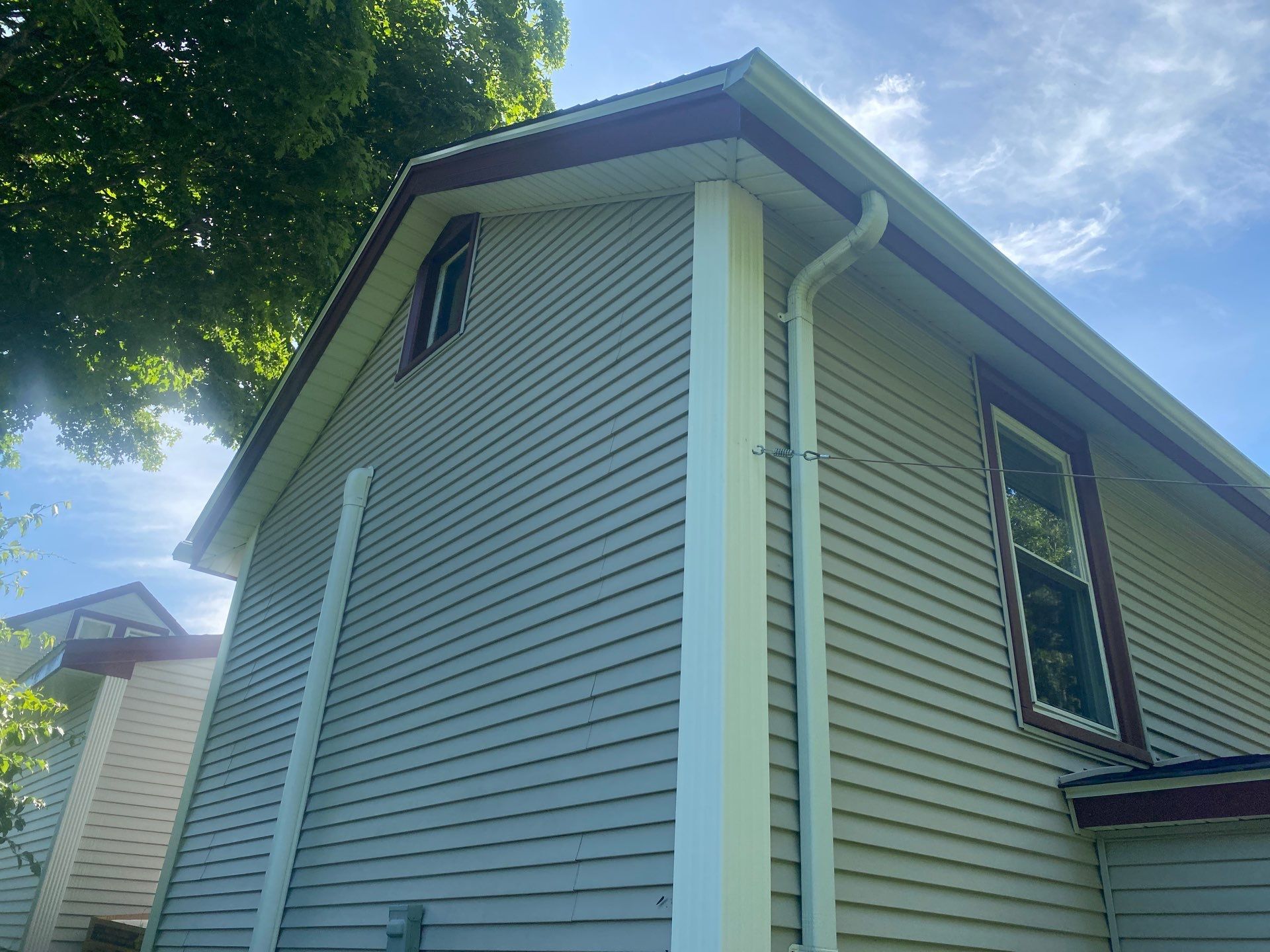West Warwick, RI Siding: New Vinyl Siding with Trim & Stone-Veneer Accent
