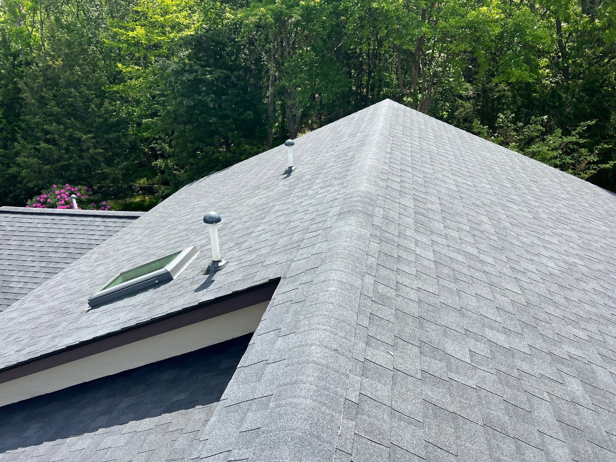 After — East Greenwich, RI Skylight Installation — Deck-Mounted Daylight on a Finished Asphalt Roof