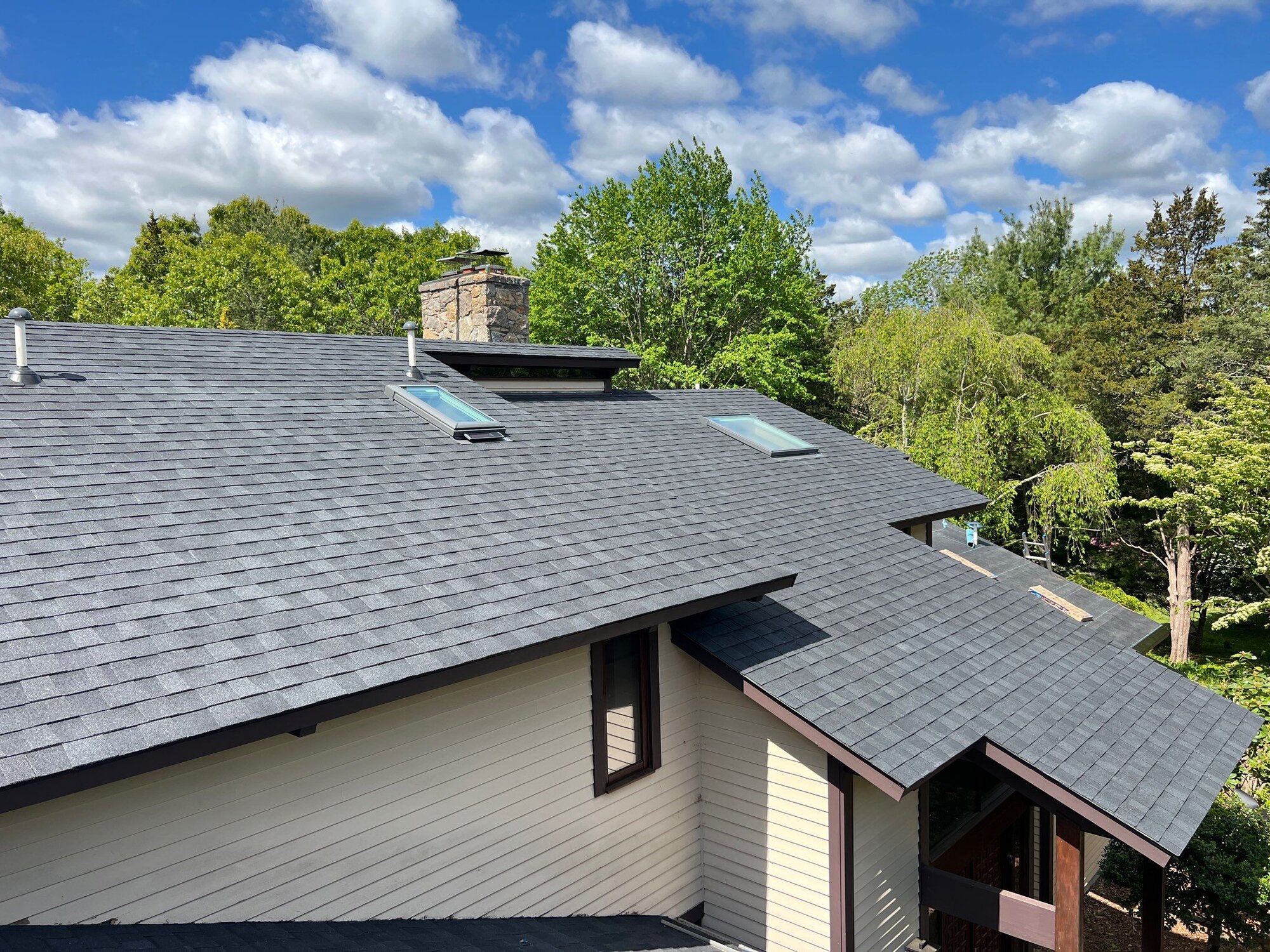 Deck-mounted skylight set into the finished roof