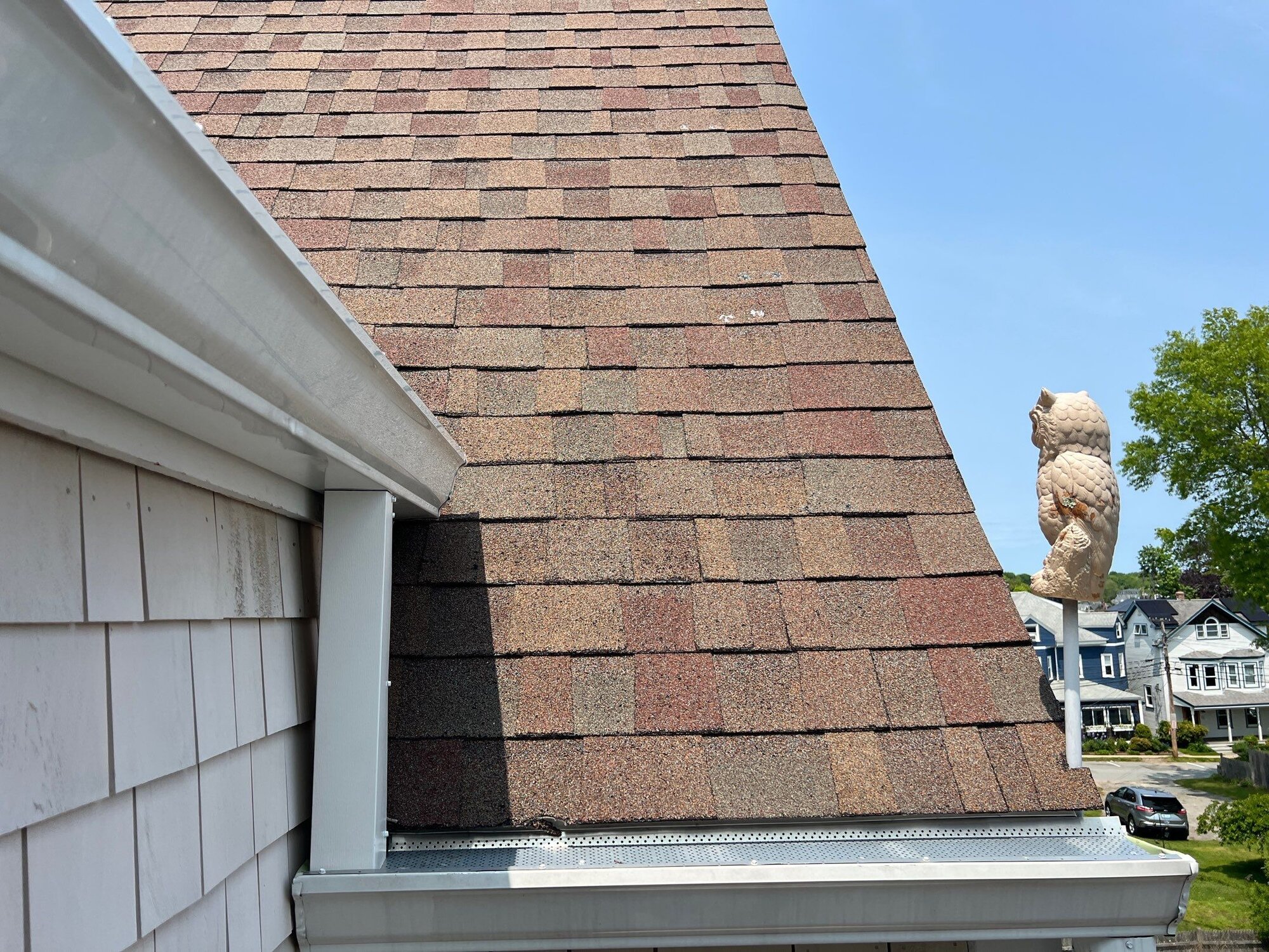 After — Jamestown, RI Roof Repair — Sidewall Flashing and Sealed Roof-to-Wall Details Blended Into the Existing Roof
