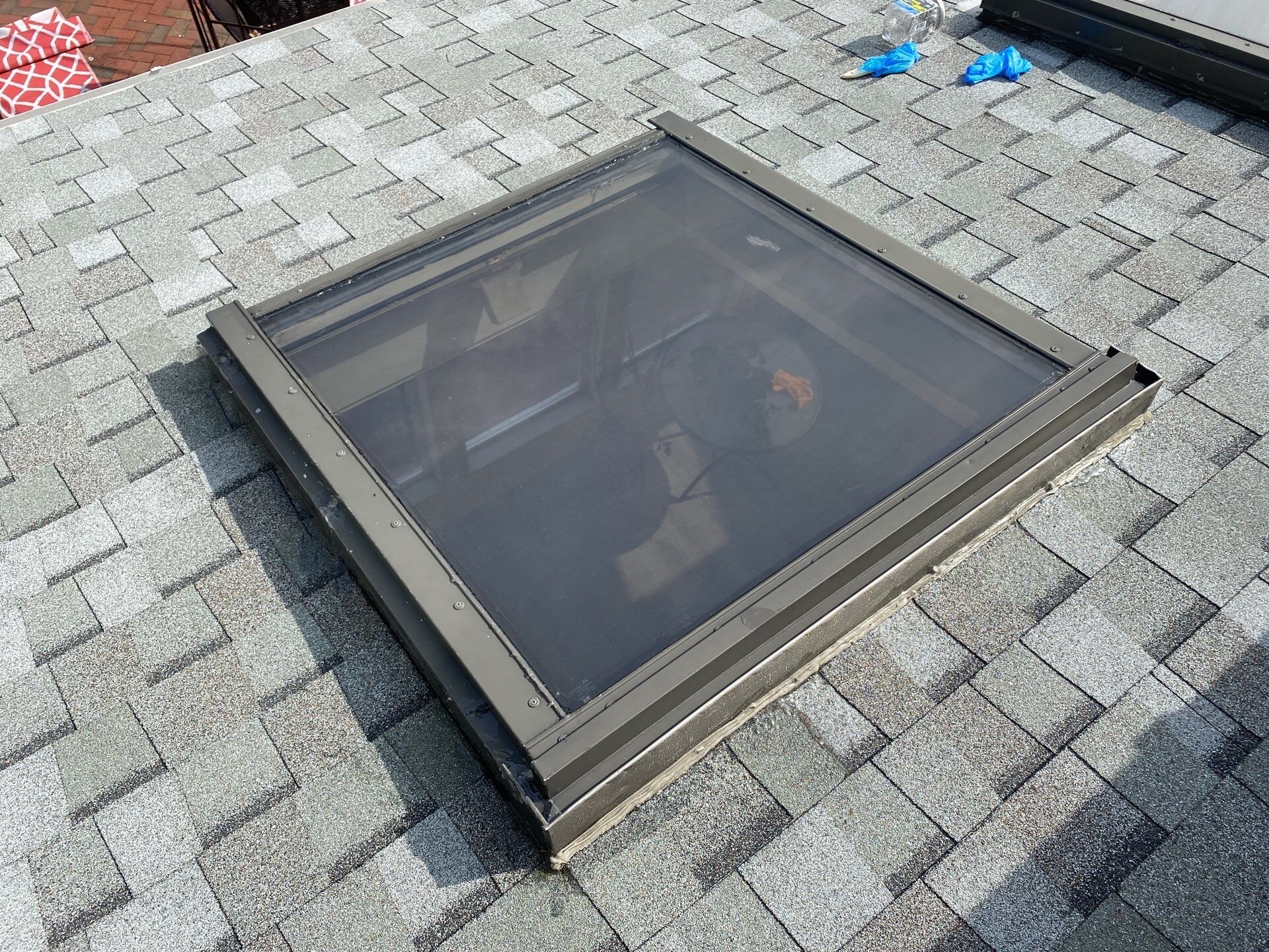 After — North Smithfield, RI Skylight Installation — New Deck-Mounted Skylight and Clean Flashing on an Asphalt Roof