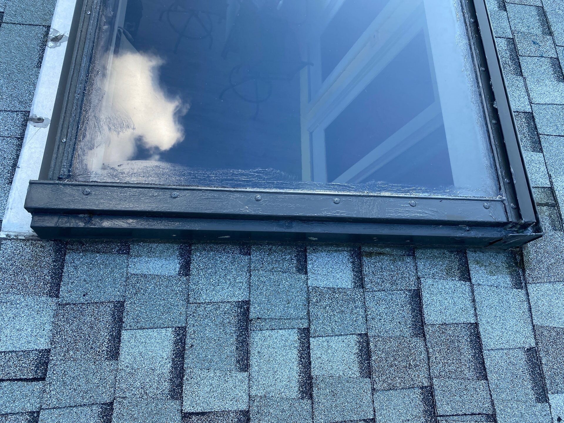 Deck-mounted skylight set into the finished roof