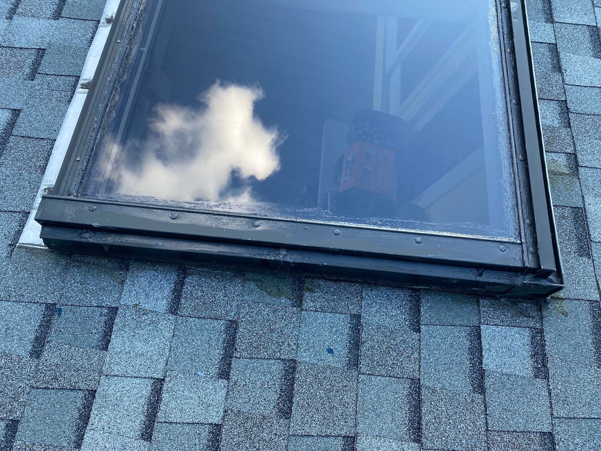Clean skylight flashing detail on the completed roof