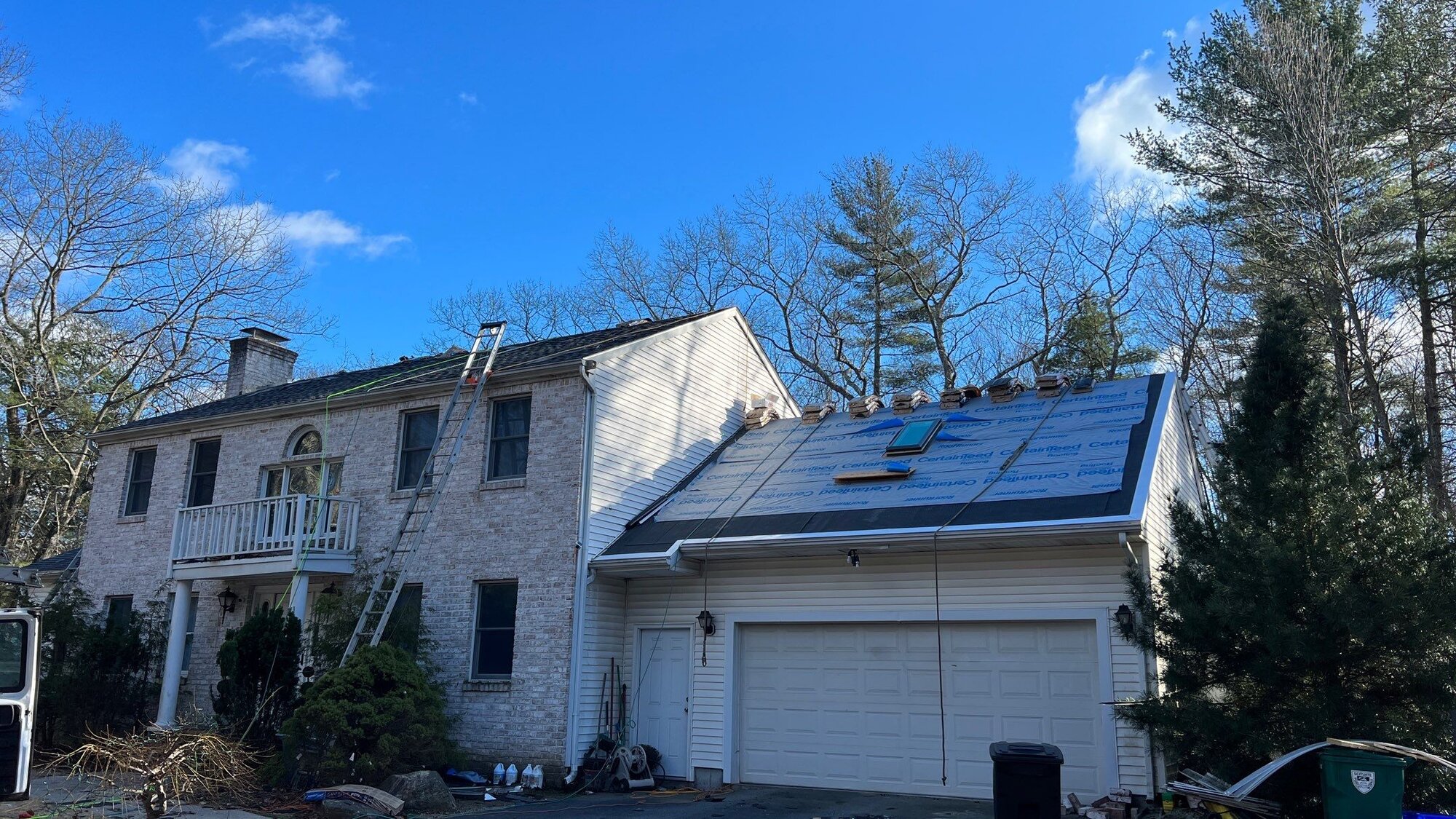 After — Scituate, RI Skylight Installation on Sprucebrook Rd: Two Deck-Mounted Skylights Bring Daylight to a New Roof