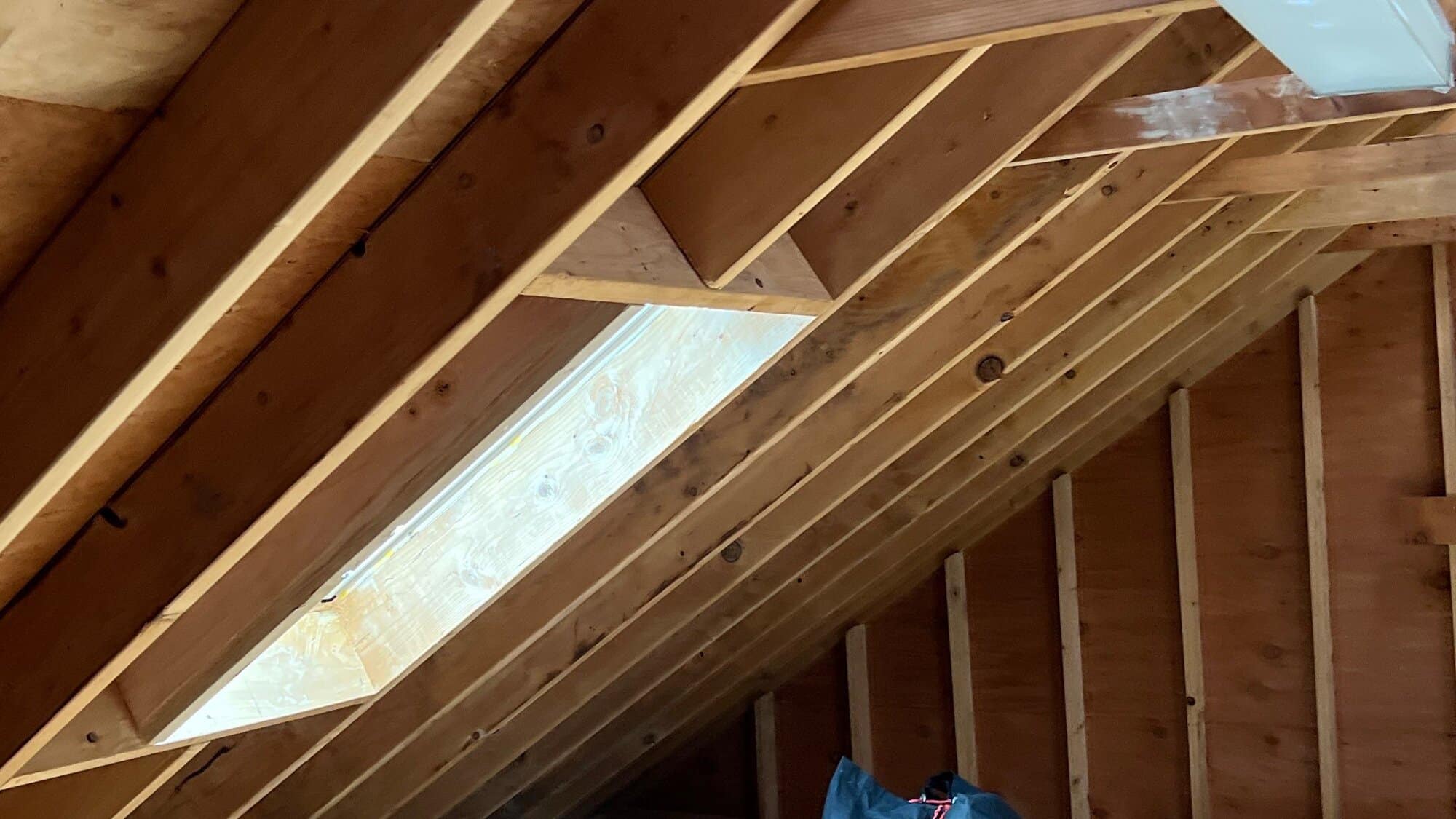 Deck-mounted skylight set into the finished roof