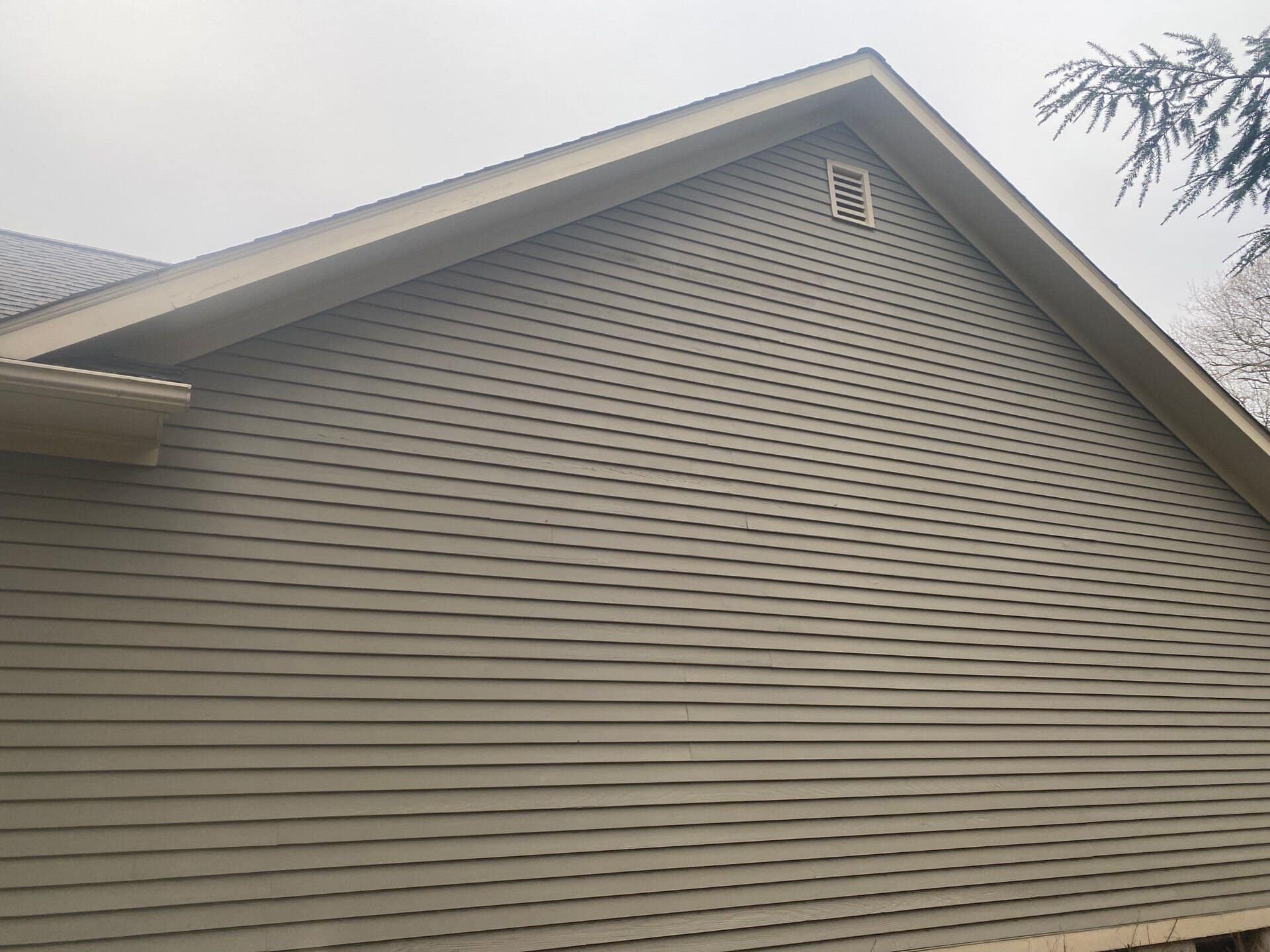 Finished elevation after the siding replacement