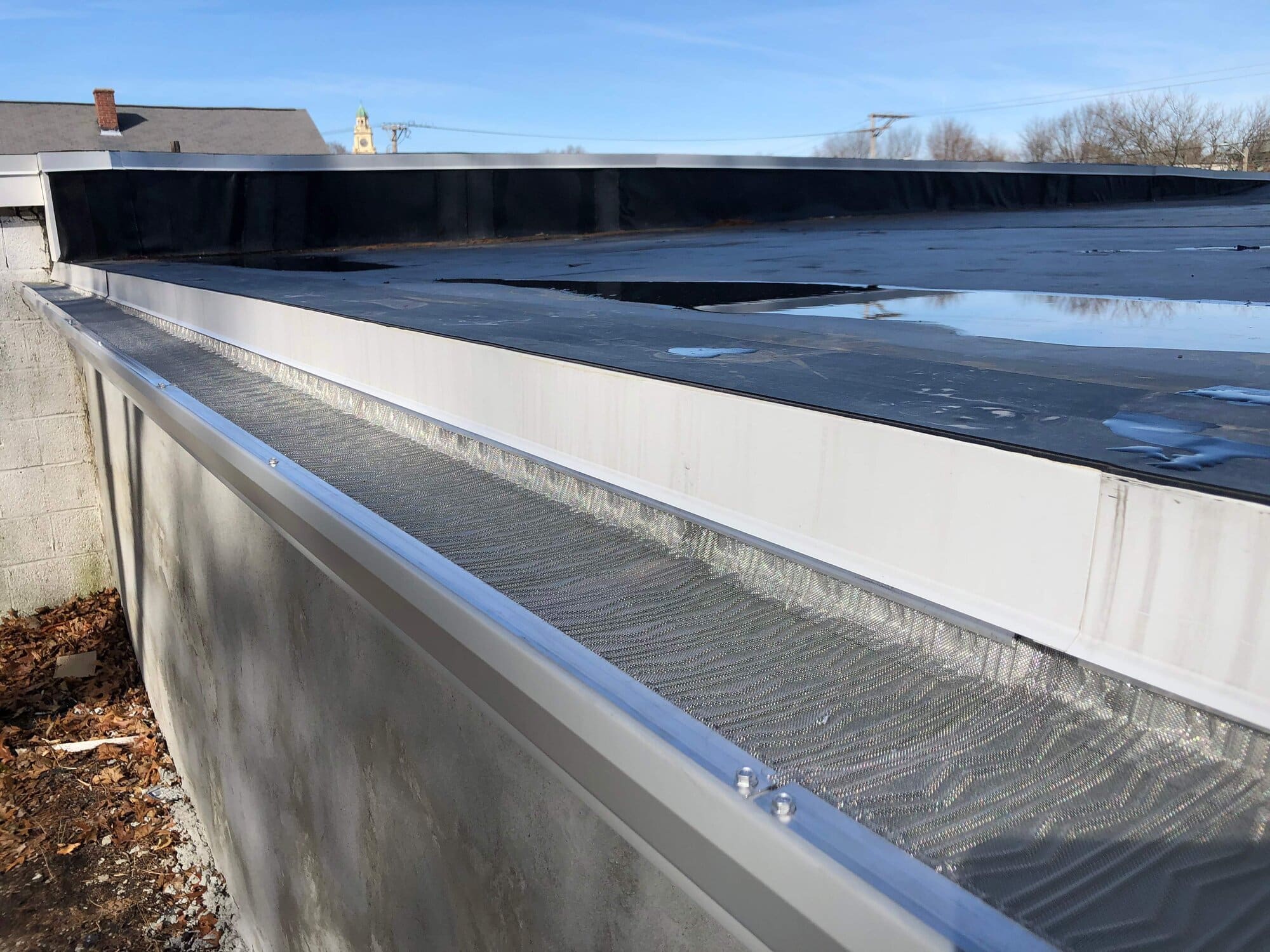 After — Central Falls, RI Commercial Roofing — Flat Membrane Roof with New Coping and Edge Metal
