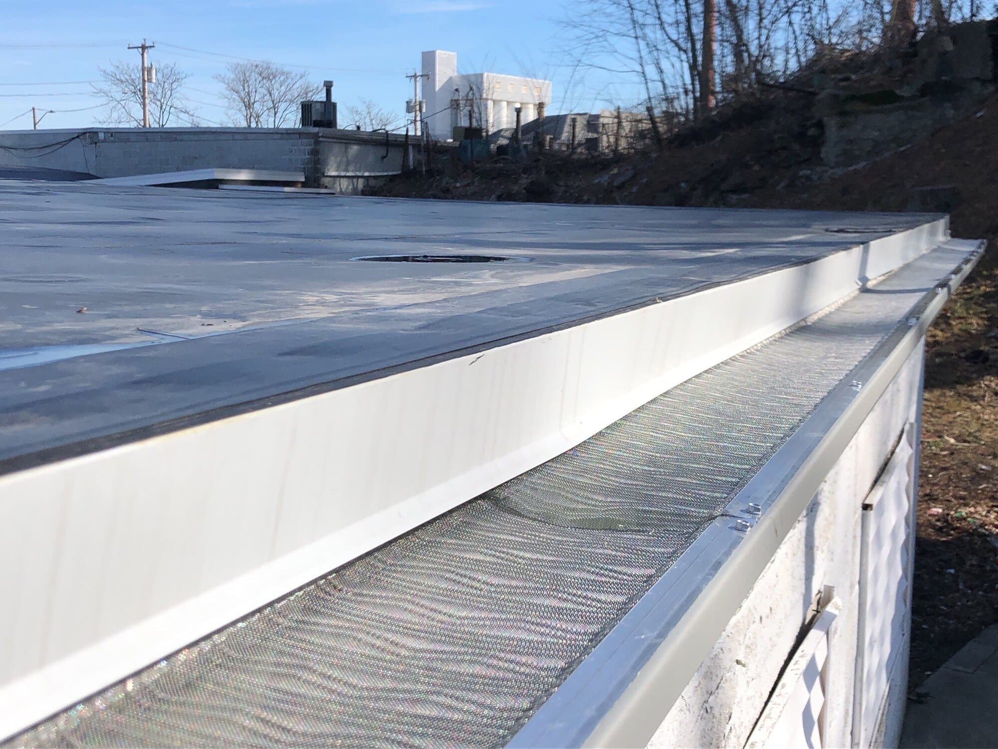 Central Falls, RI Commercial Roofing — Flat Membrane Roof with New Coping and Edge Metal
