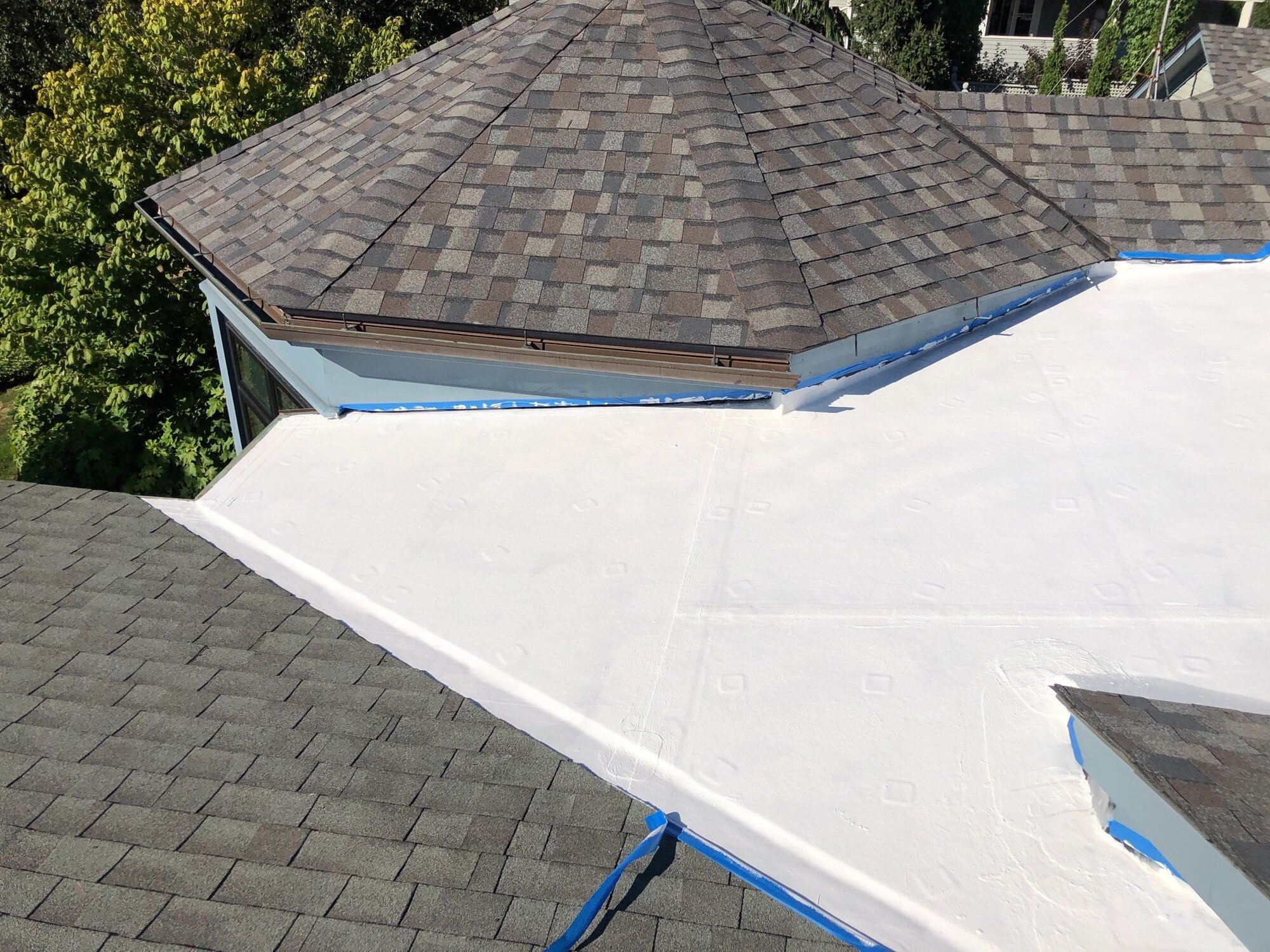 After — Jamestown, RI Commercial Roofing: Reflective Silicone Restoration on a Waterfront Flat Roof