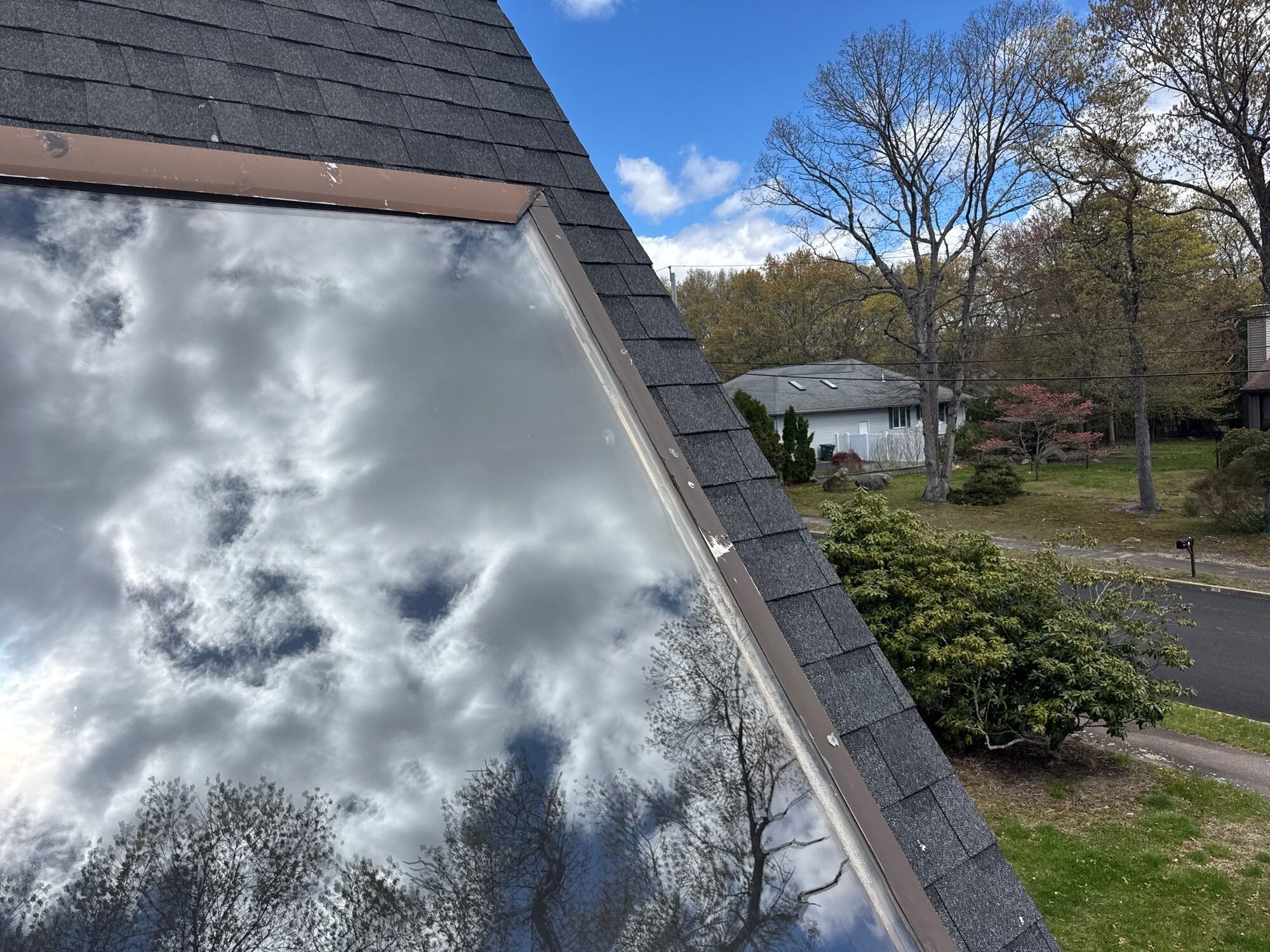 Deck-mounted skylight set into the finished roof