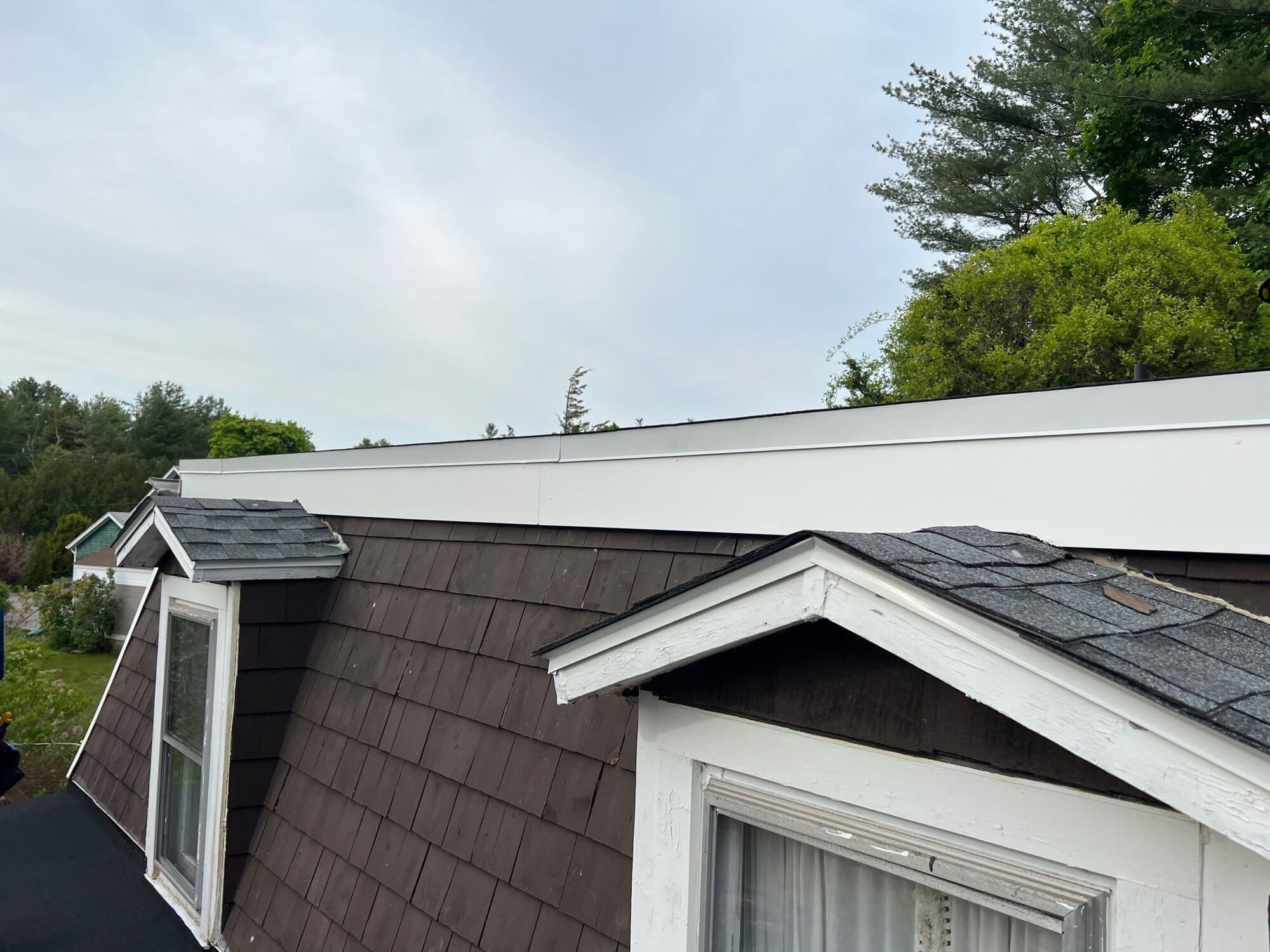 Charlestown, RI Commercial Roofing: Torch-Down Flat Roof on a Multi-Unit Mansard Building