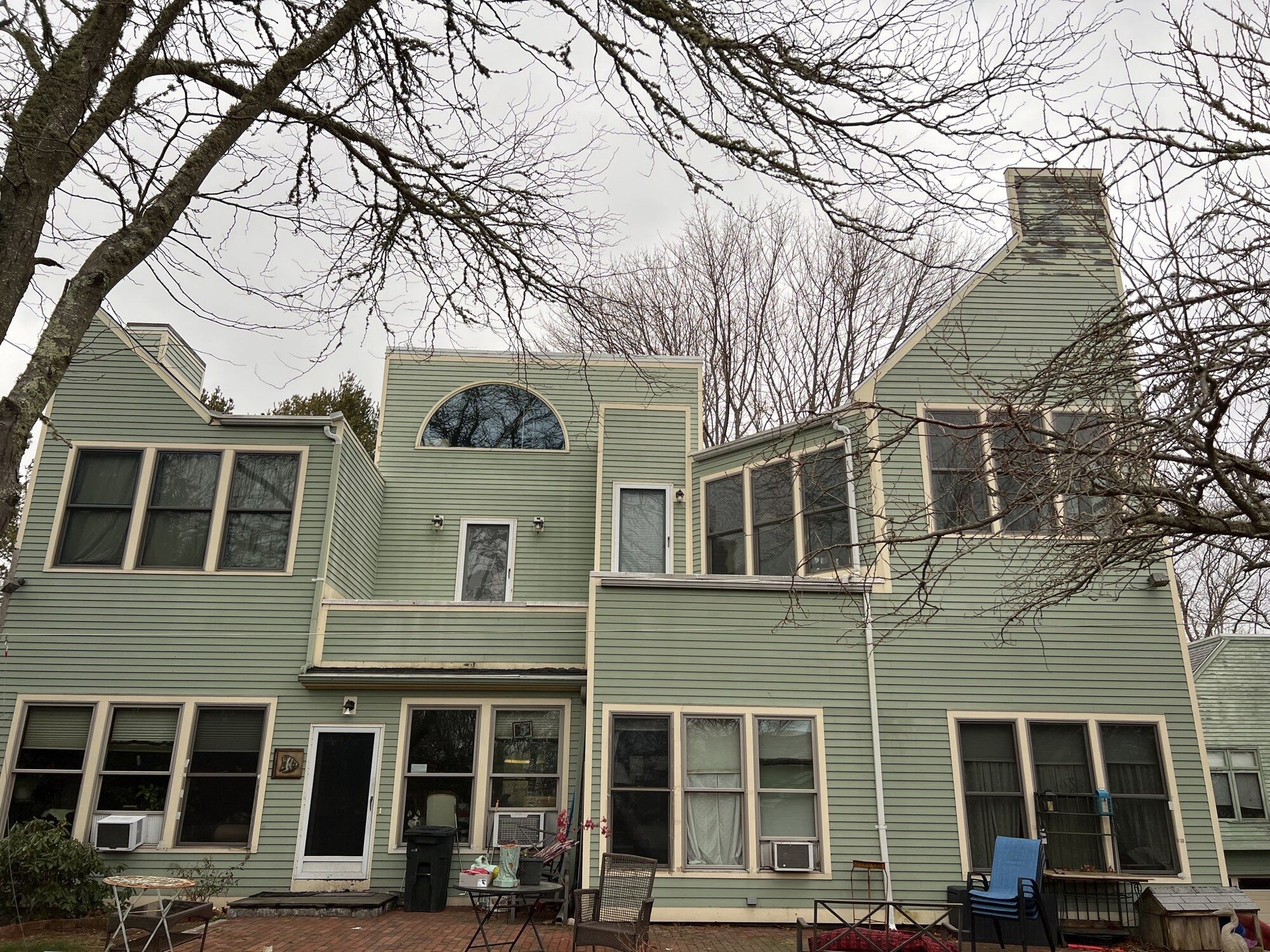 New Seamless Gutters and Downspouts for a Westerly, RI Clapboard Home