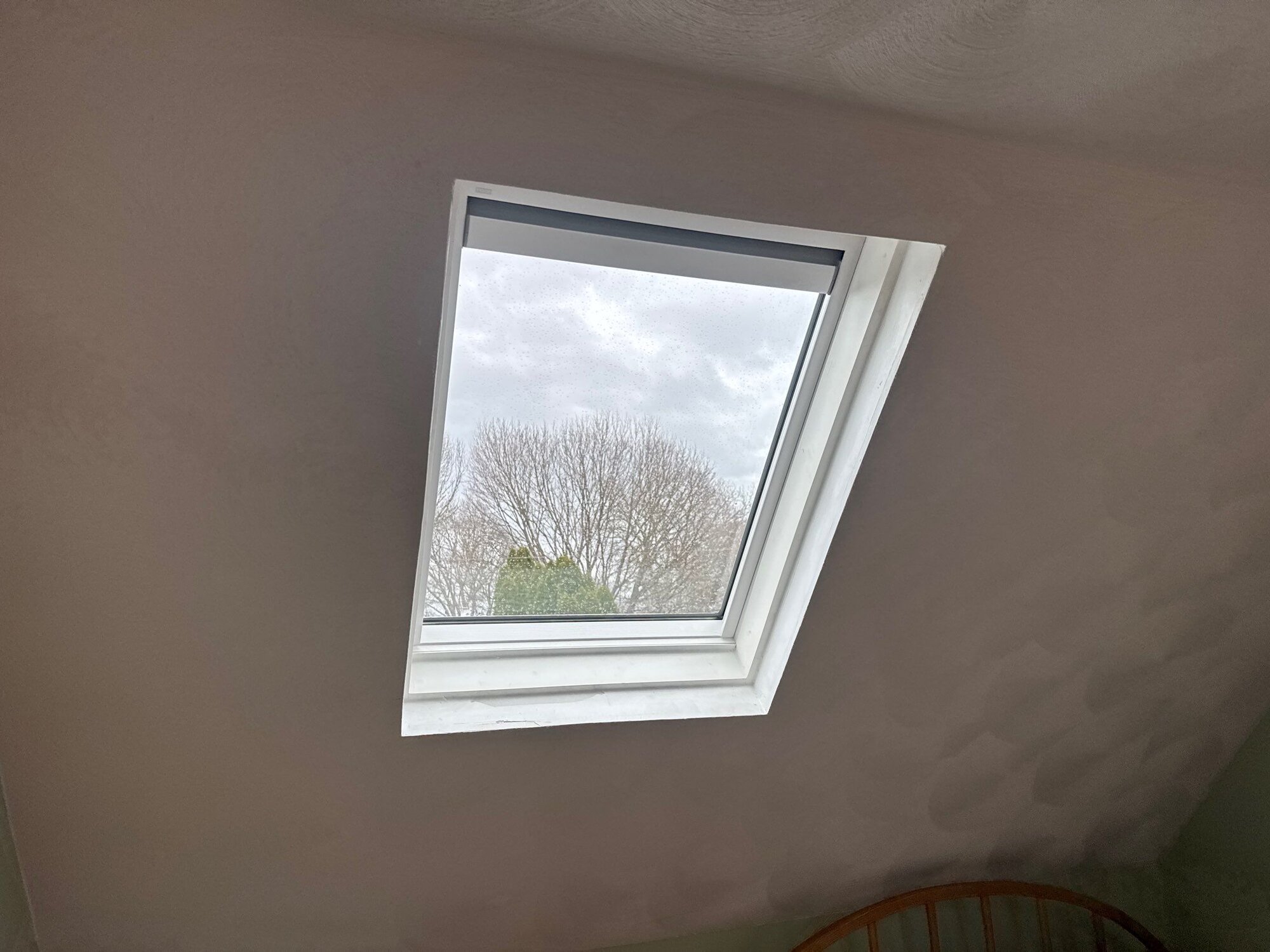Deck-mounted skylight set into the finished roof