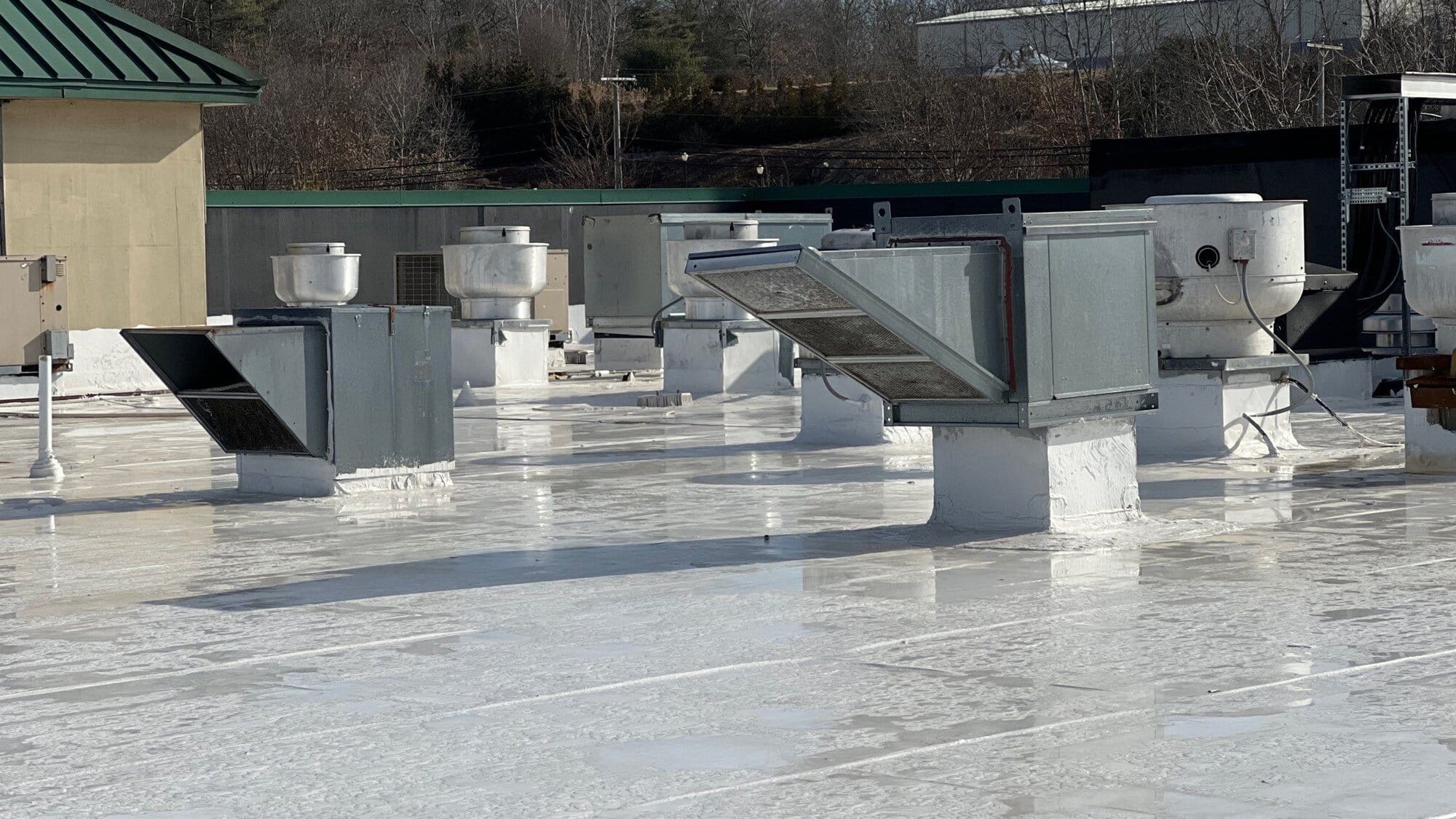 After — Exeter Commercial Low-Slope Membrane Roof for a Multi-Tenant Property