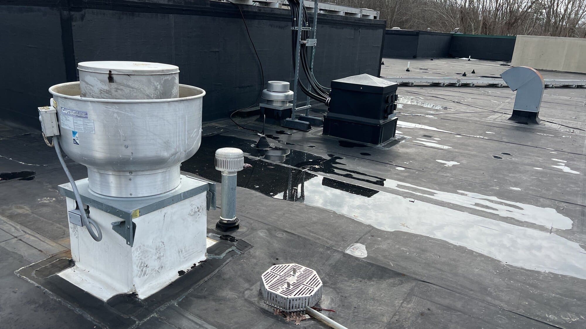 Completed commercial roof system with proper drainage