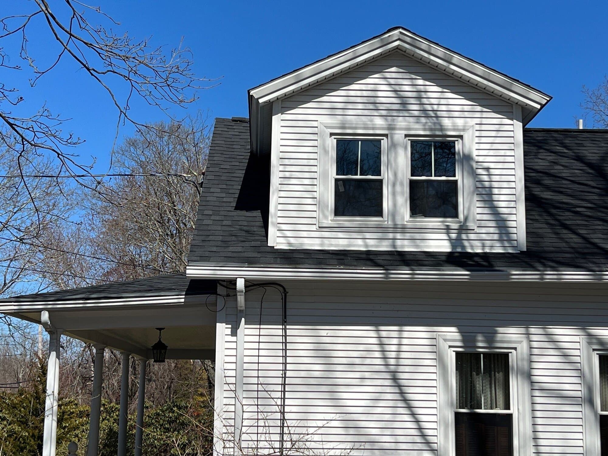 Continuous ridge vent runs the length of the finished roof peak