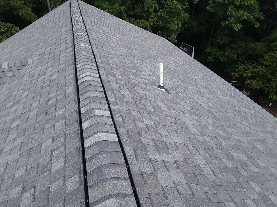 After — West Greenwich, RI Roof Replacement: The Attic Ventilation That Protects Your Shingle Warranty