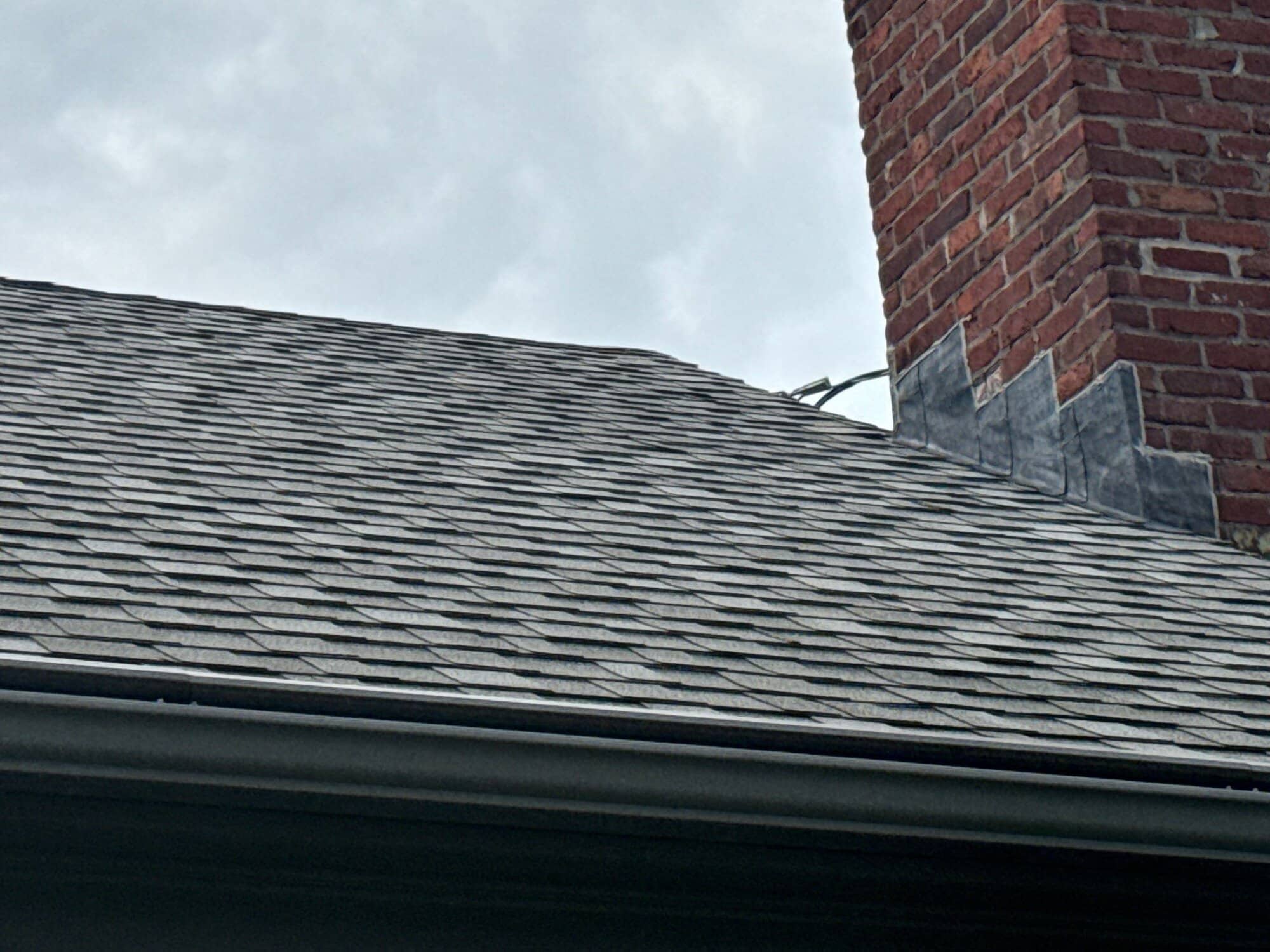 Continuous ridge vent runs the length of the finished roof peak