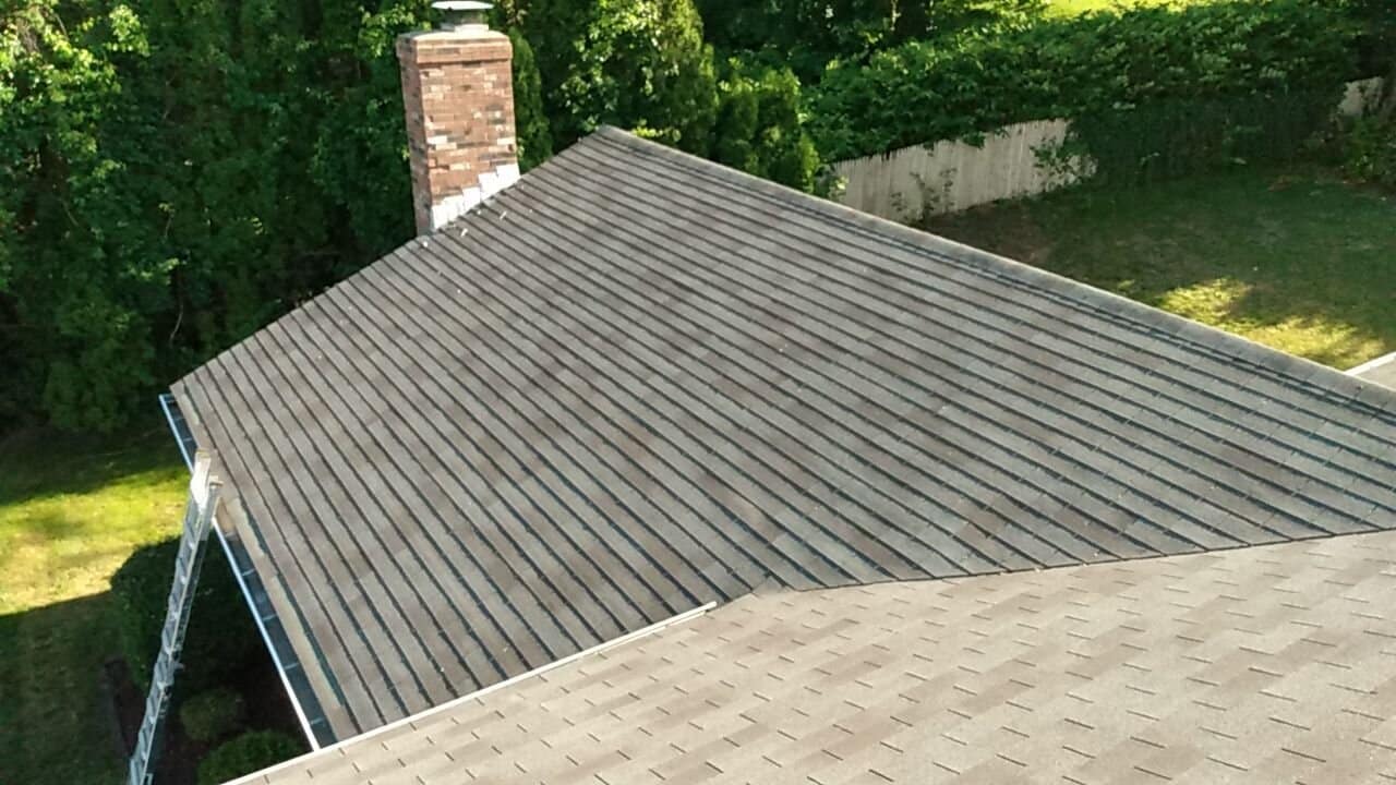 Clean ridge line on the completed Georgetown Gray roof