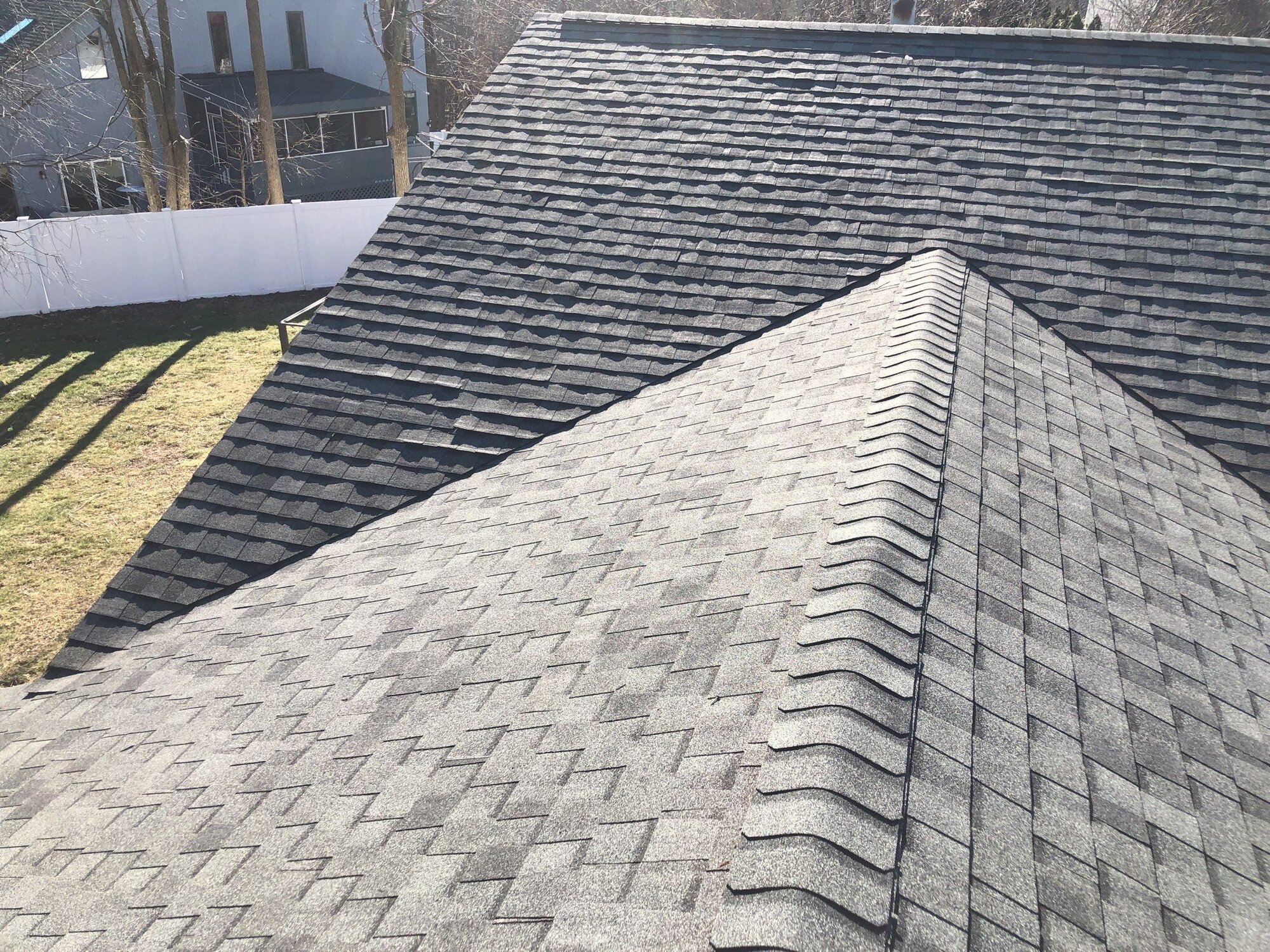 After — North Providence, RI Roof Replacement: A Granite Gray Roof Vented Against Winter Moisture and Ice Dams