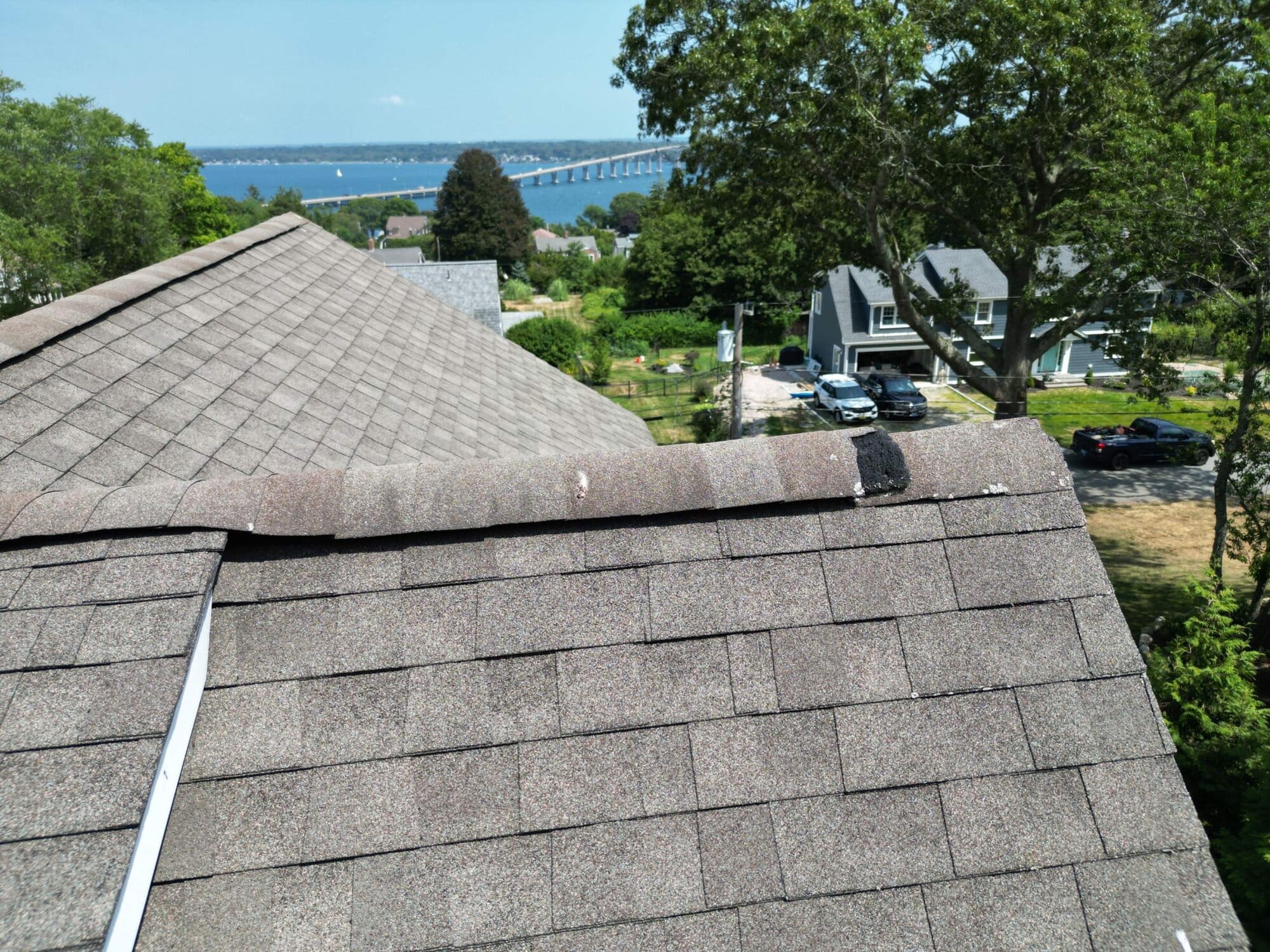 Saunderstown, RI Roof Replacement: A Waterfront Gambrel-Cape Vented to Protect Shingle Lifespan