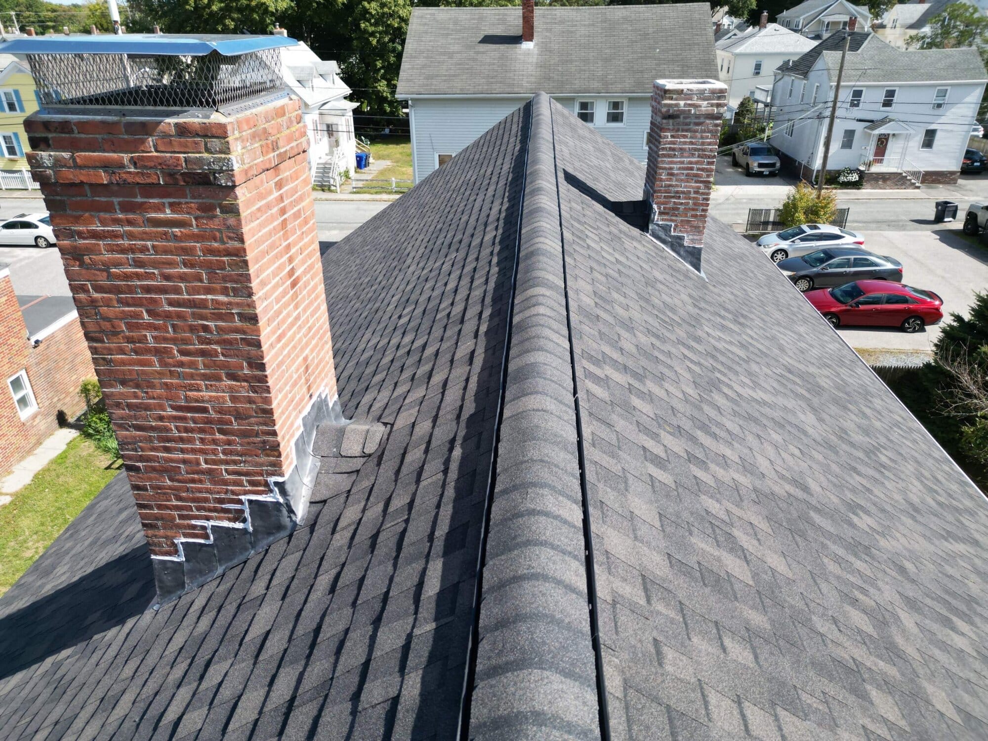Continuous ridge vent runs the length of the finished roof peak