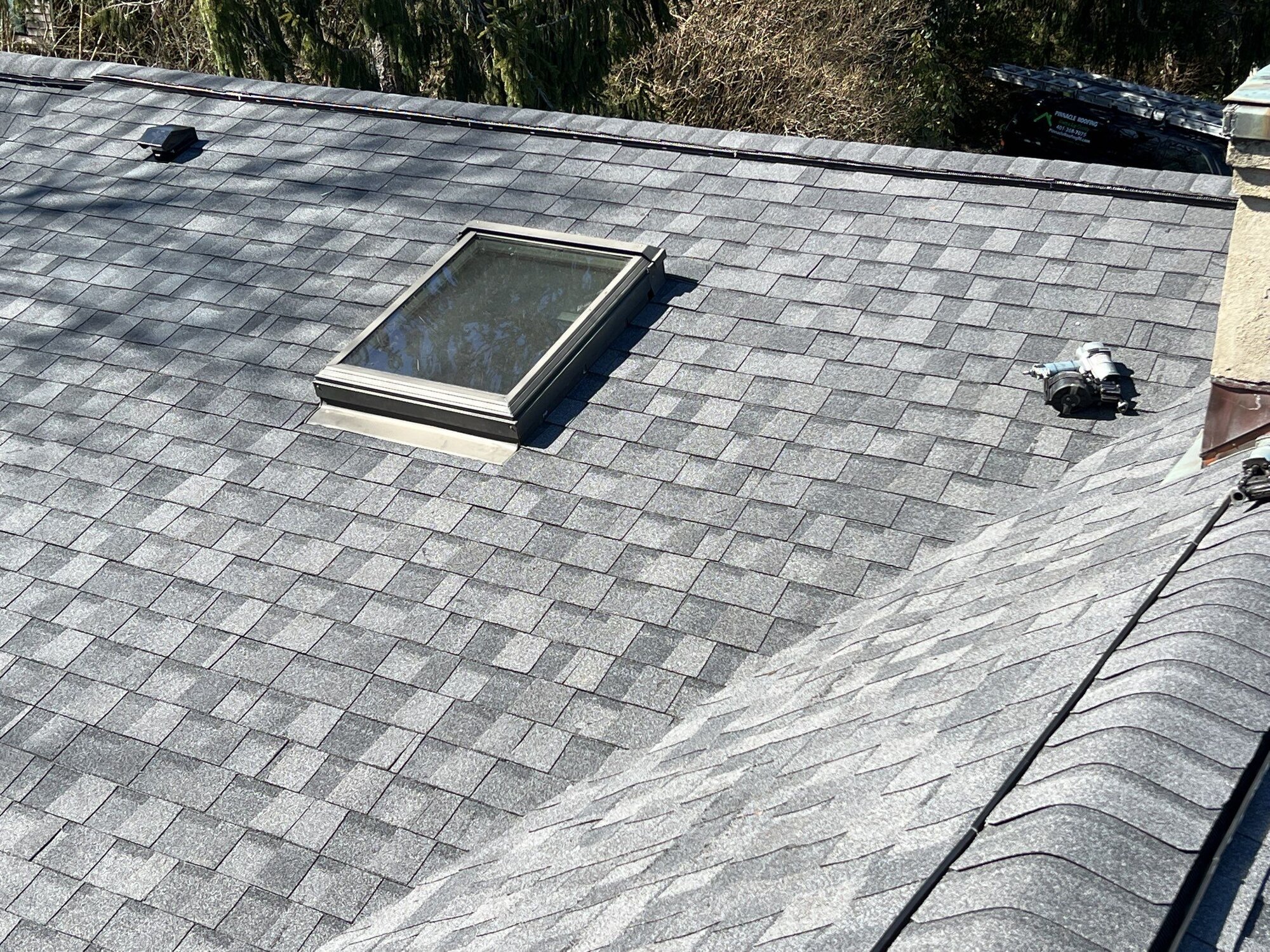 After — Skylight Installation in Newport, RI — Pewterwood Roof on a Stone Estate