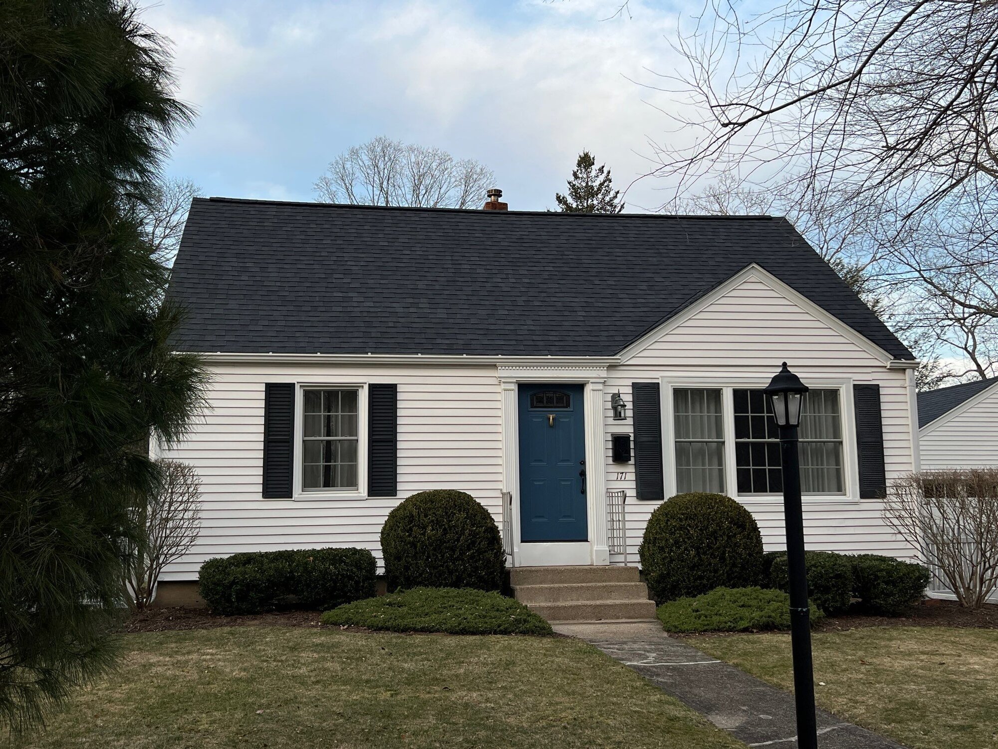 After — Charcoal Black Roof Replacement on an East Greenwich Cape, RI