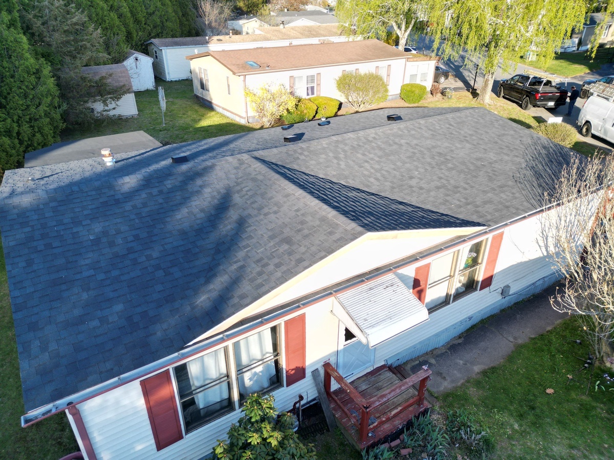 After — CertainTeed Landmark Charcoal Black Roof Replacement with Deck Repair in Coventry, RI