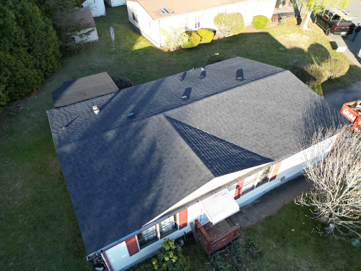 Completed CertainTeed Landmark Charcoal Black roof aerial angle in Coventry RI by Pinnacle Roofing