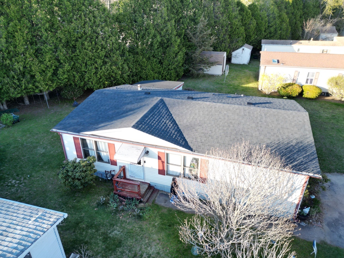 CertainTeed Landmark Charcoal Black roof rear drone view in Coventry RI by Pinnacle Roofing