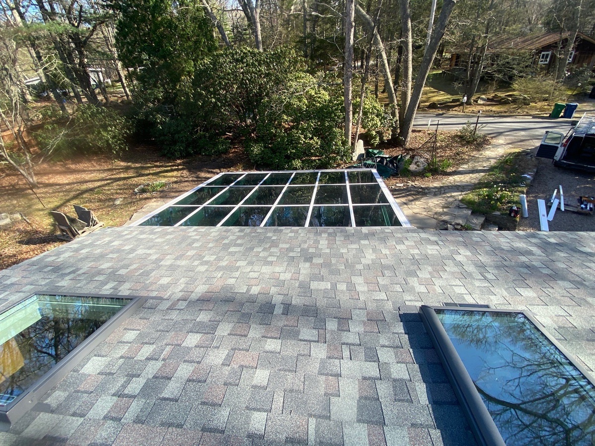 Drone view of CertainTeed Landmark PRO Colonial Slate roof with VELUX skylights in Kingston RI