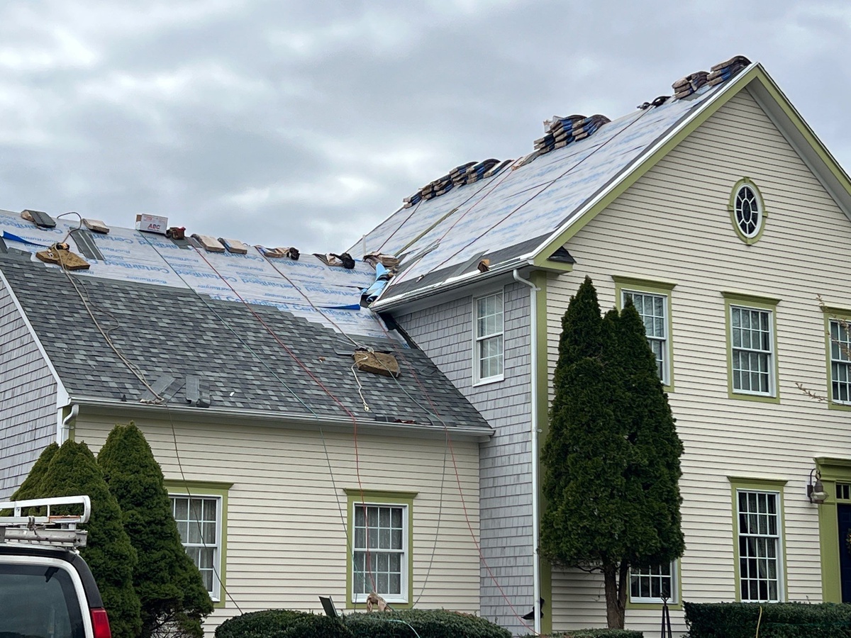 Side elevation of completed Georgetown Gray roof replacement on Misty Meadow Lane North Kingstown