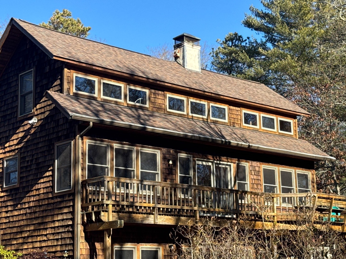 Final completed view of CertainTeed Landmark PRO Heather Blend roof with VELUX skylights in South Kingstown RI