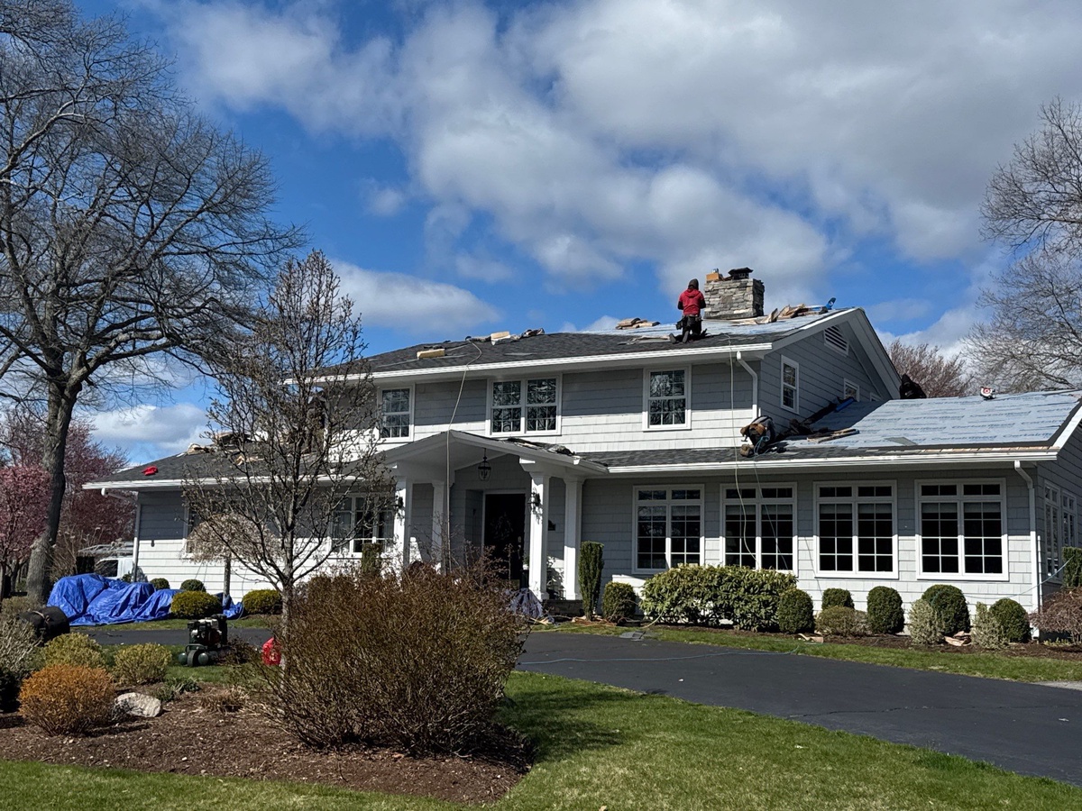 Completed roofing and skylight project on Warwick RI home before solar panel installation