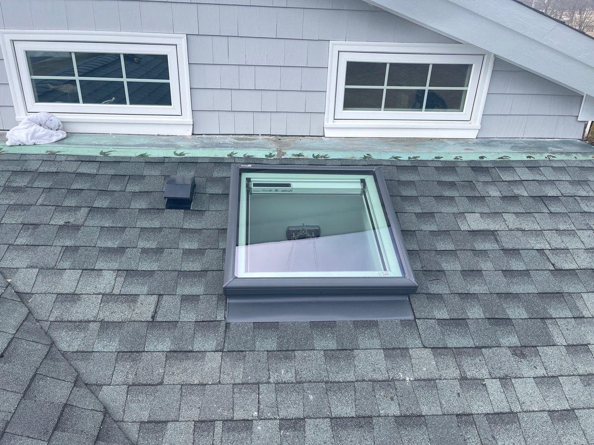 CertainTeed Landmark PRO Moire Black roof with VELUX skylights in Warwick RI streetside view