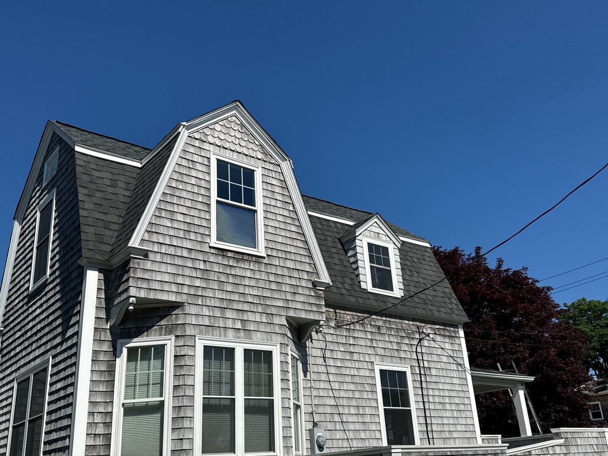 Mansard roof detail showing Pewterwood shingle color on Jamestown commercial building