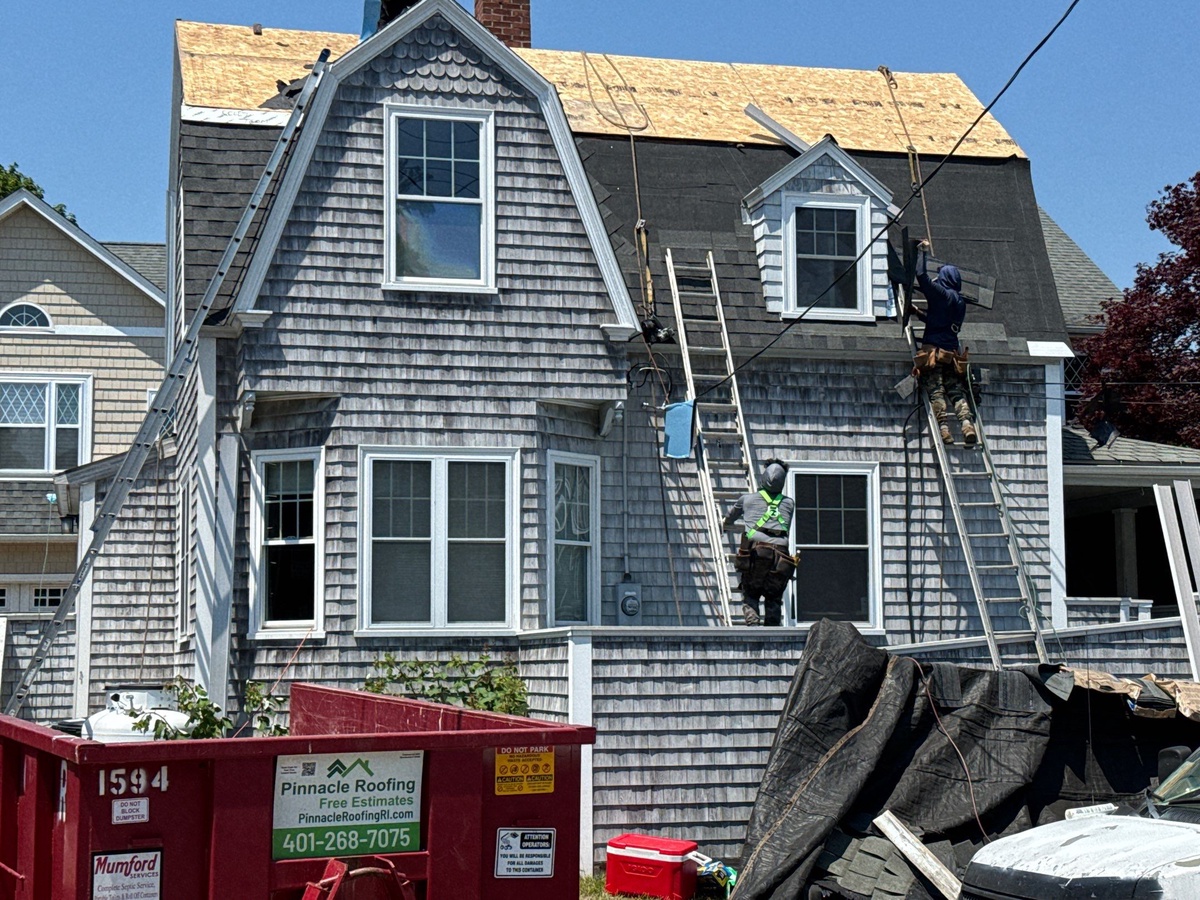 Street view of completed Pewterwood mansard roof replacement Narragansett Ave Jamestown