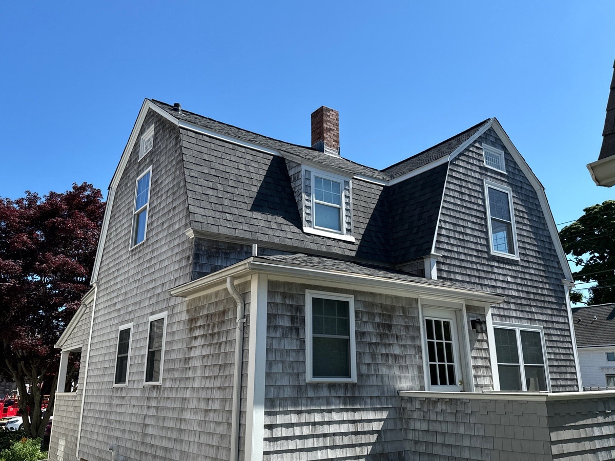 Completed mansard roof and trim on former Jamestown Press building Narragansett Avenue