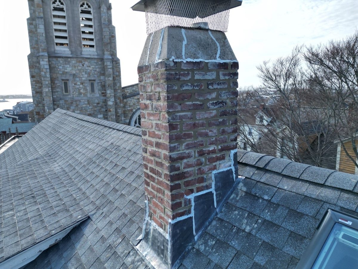 Rebuilt brick chimney and new roof, Newport Spring Street