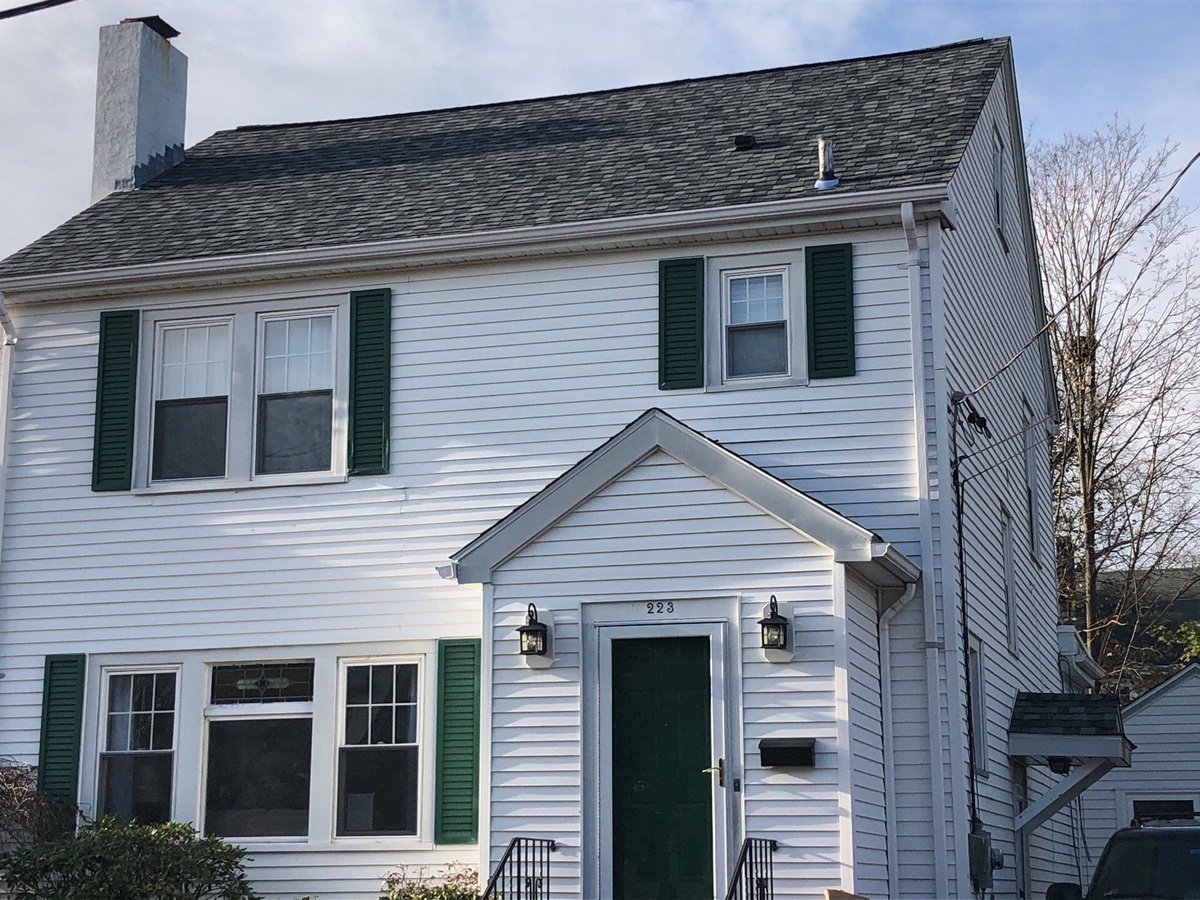 After — Landmark PRO Granite Gray and VELUX Skylights — A Pawtucket, RI Colonial’s Roof Replacement
