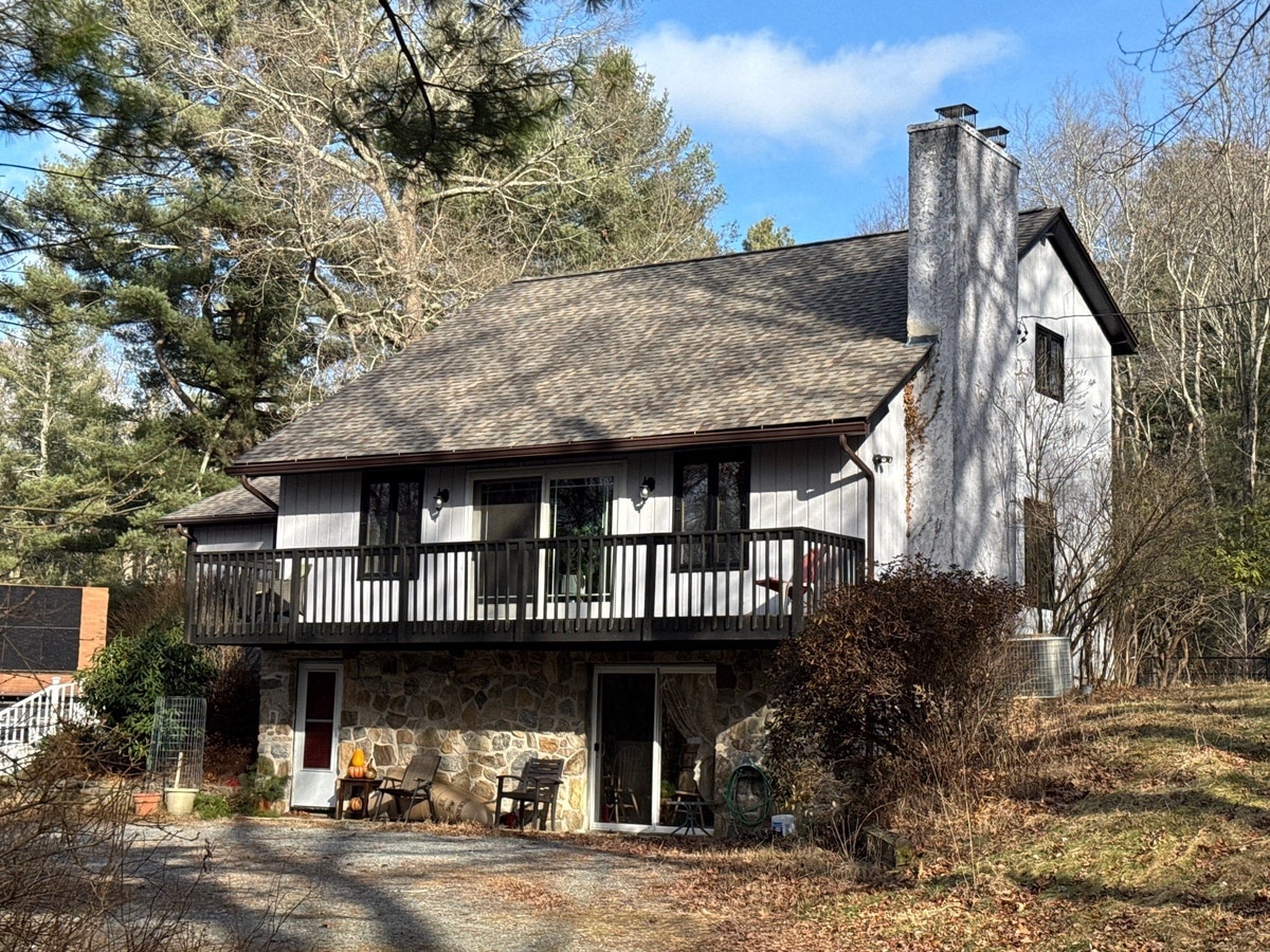 After — Foster, RI Roof in CertainTeed NorthGate Weathered Wood with Solar-Venting VELUX Skylights